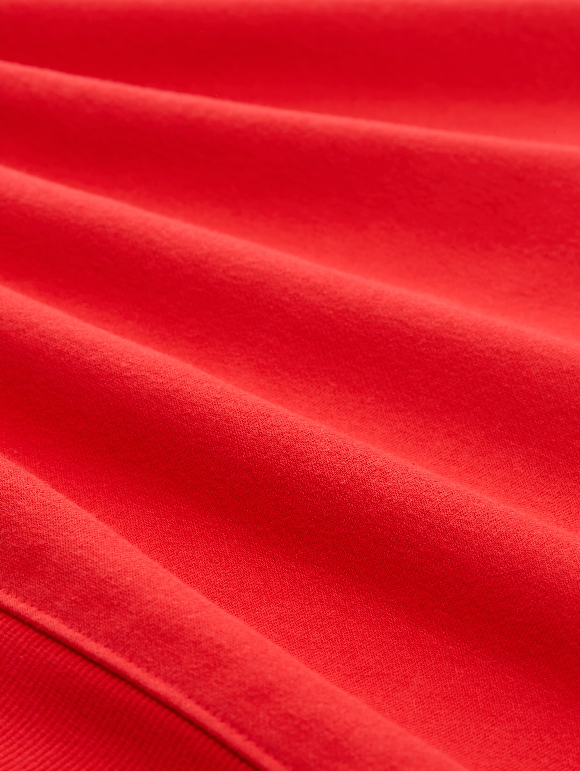 Sweatshirt met glitterborduursel - brilliant red - Materiaalweergave