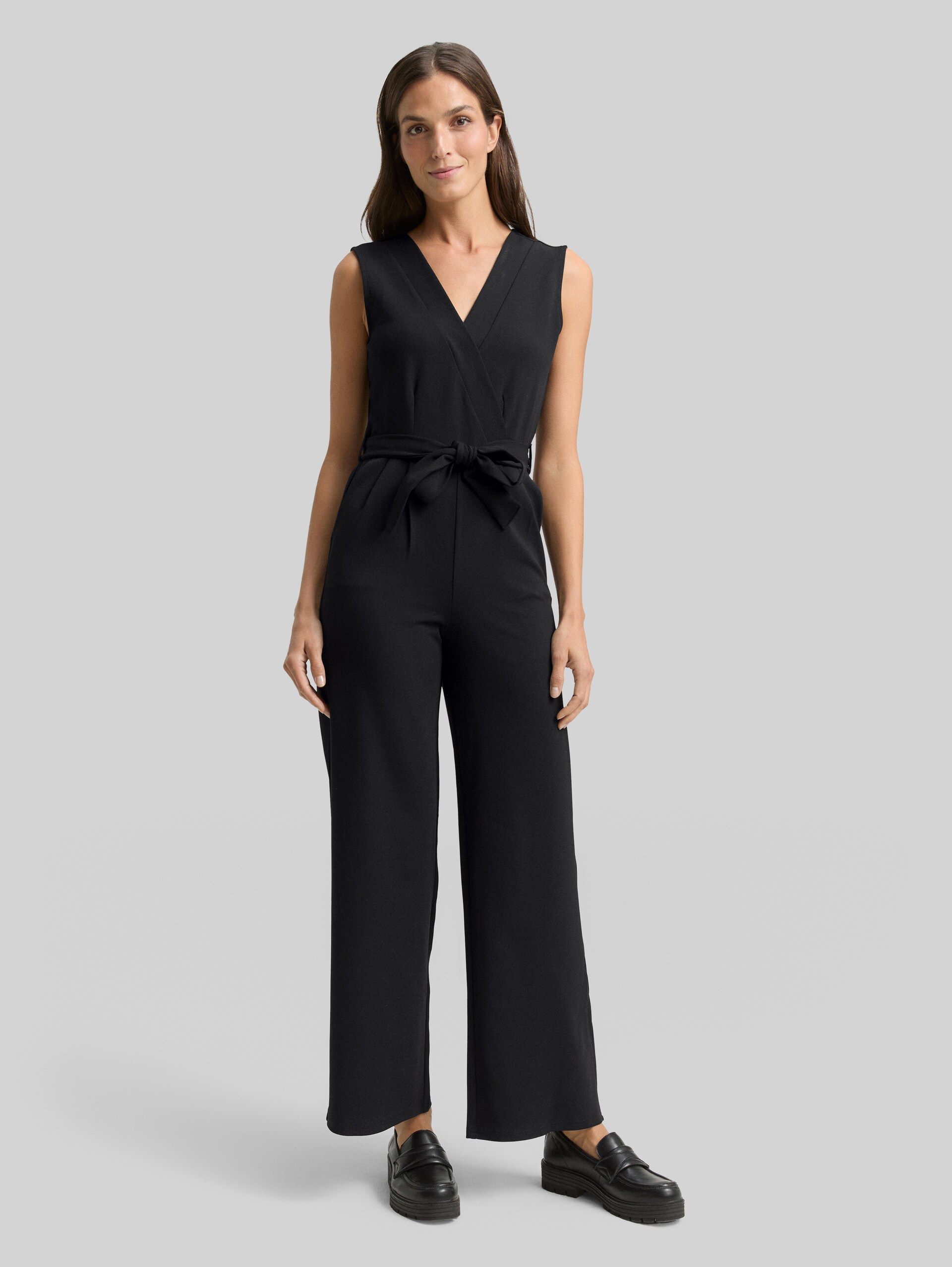 Jumpsuit with a tie belt - deep black - side model view