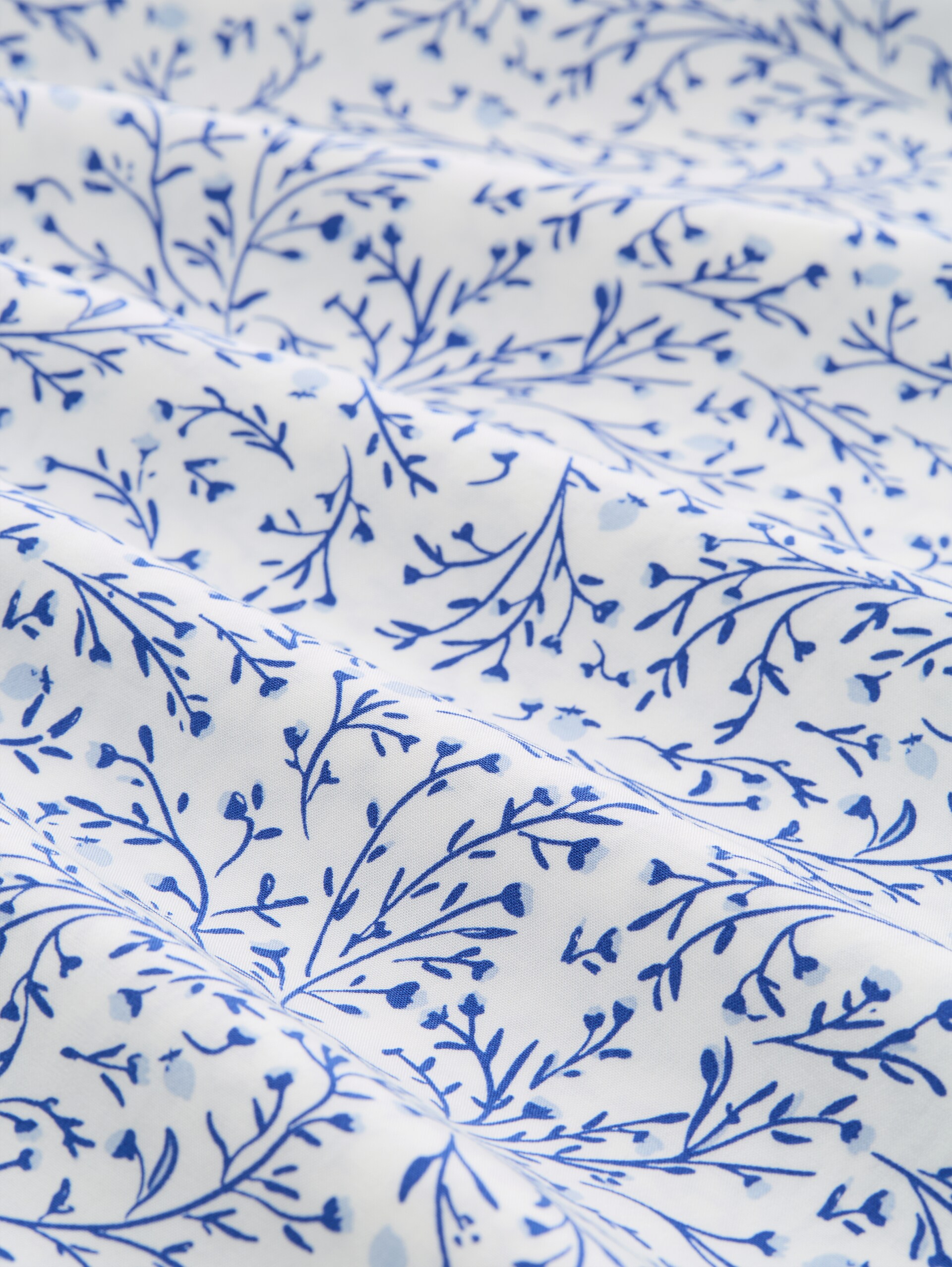 Blouse met patroon - white small leaves design - Materiaalweergave
