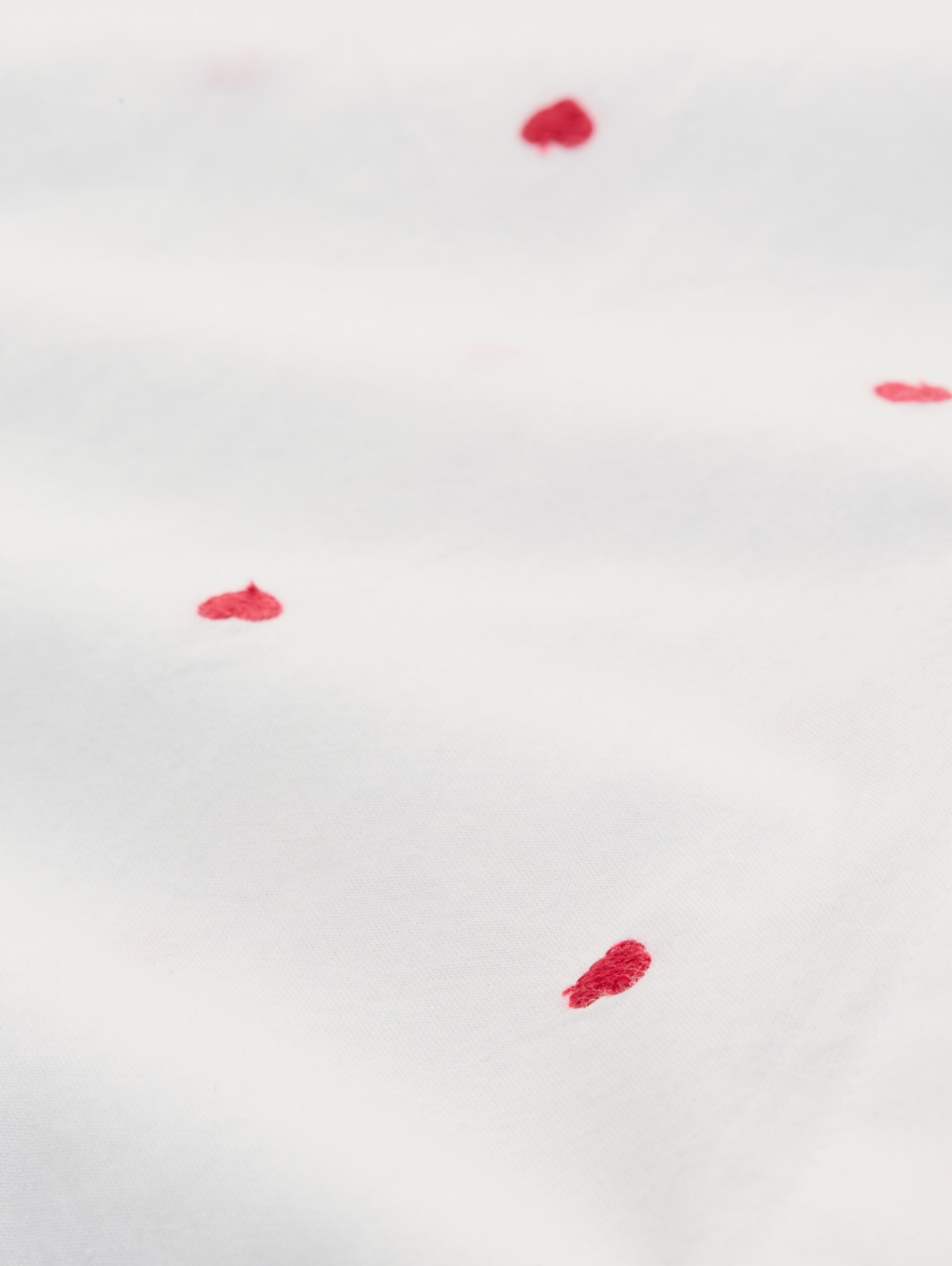 Blouse with heart embroidery - white red heart design - Material view