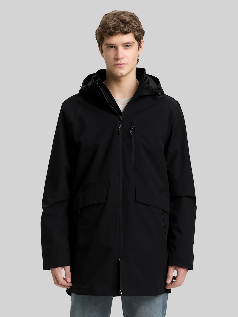 Relaxed Fit Ultralight Funktionsjacke aus wasserabweisendem Material von Denim Male, Black