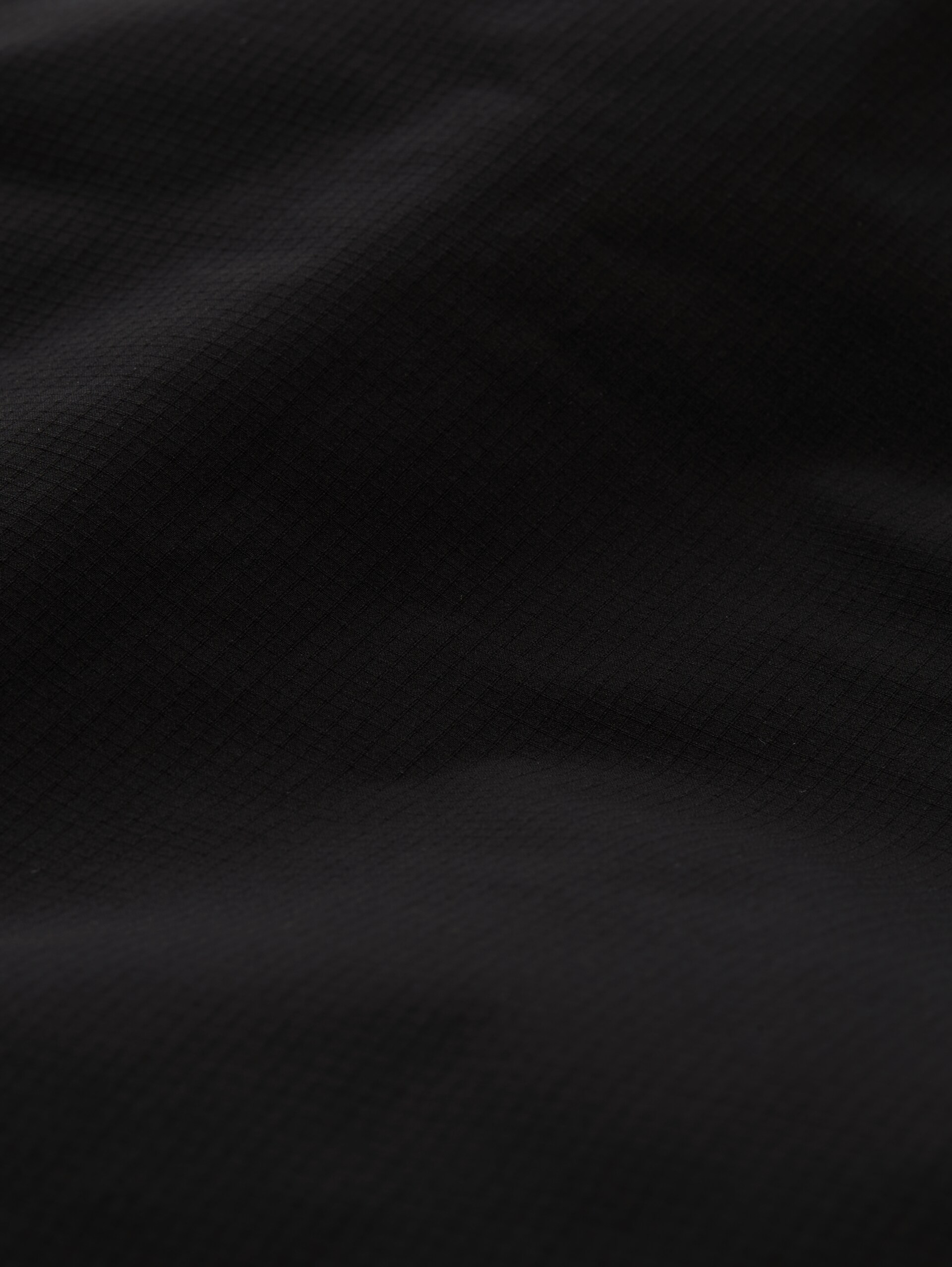 Relaxed Fit Ultralight Funktionsjacke aus wasserabweisendem Material - Black - Produkt-Detail-Ansicht