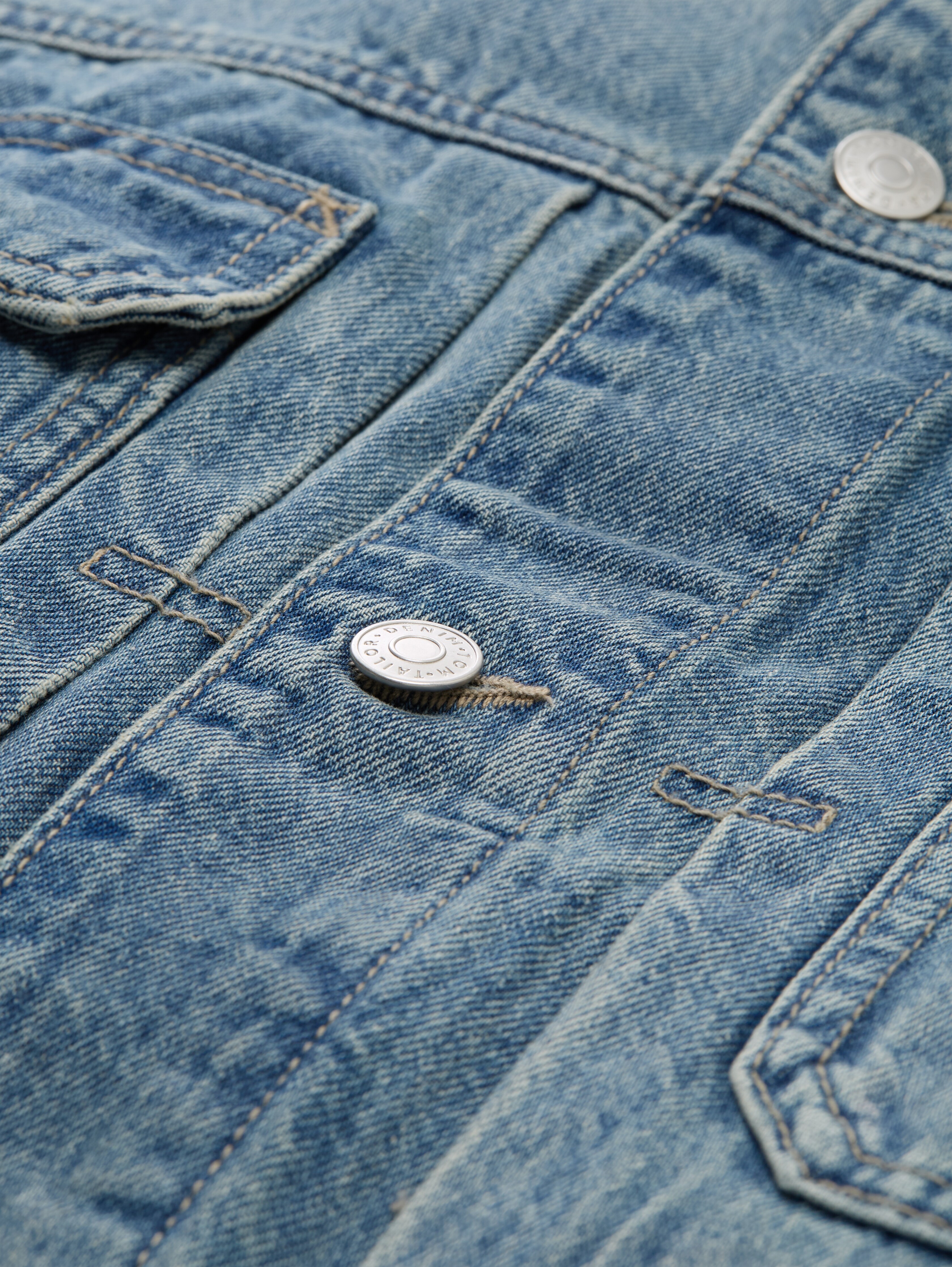 Relaxed fit denim jacket with slit pockets in blue by Tom Tailor