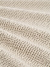 Pull en coton - structured stripe beige white - Vue de la matière