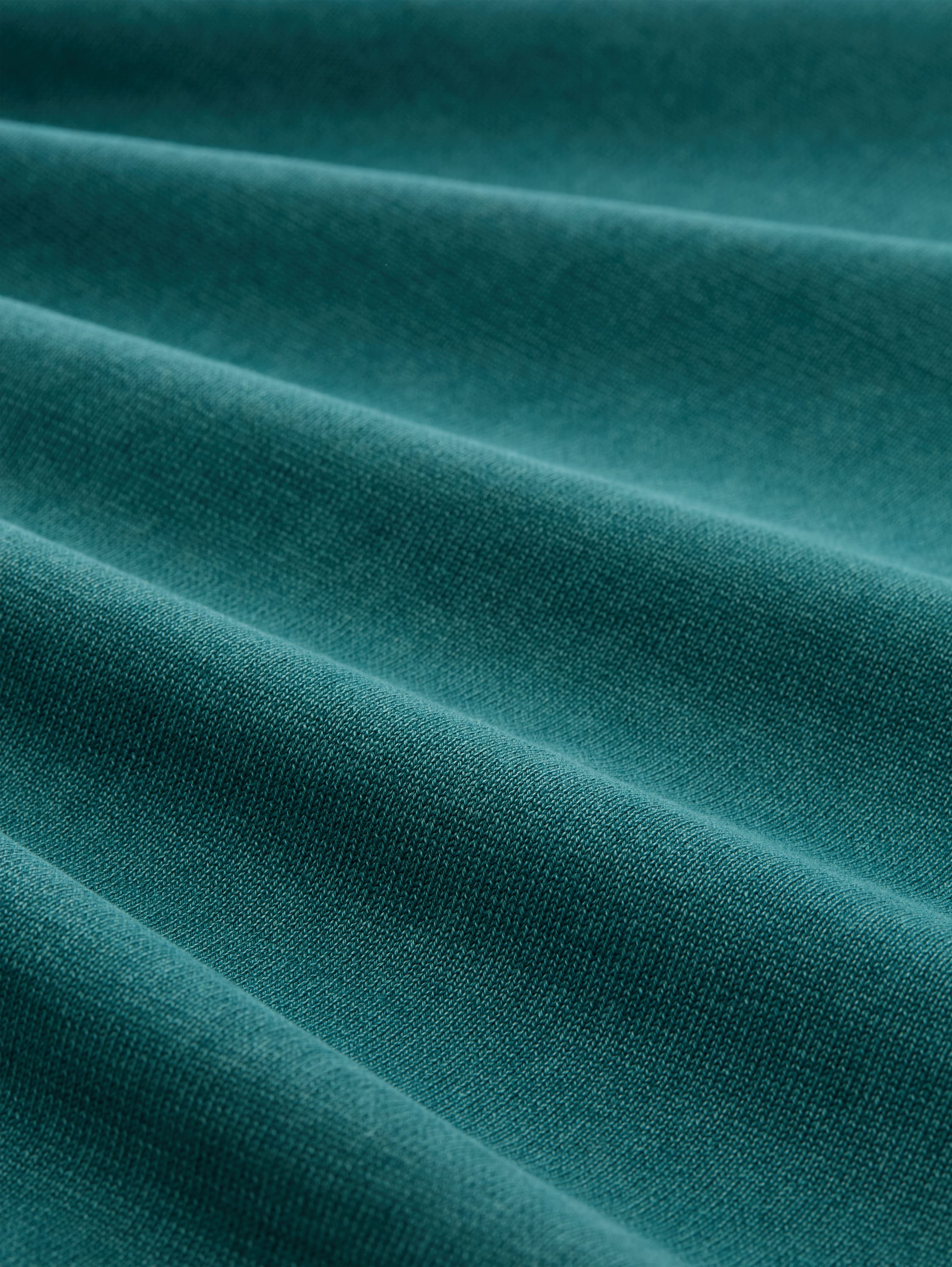 Knitted jumper made from cotton - Deep Meadow Green - Material view