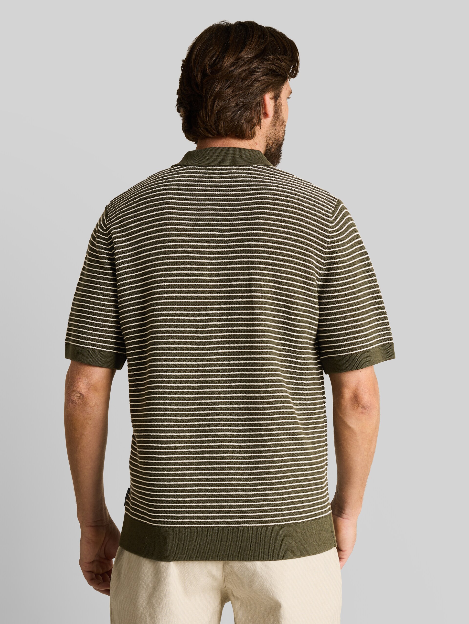 Knitted sweater with a polo collar - leaf green offwhite stripe