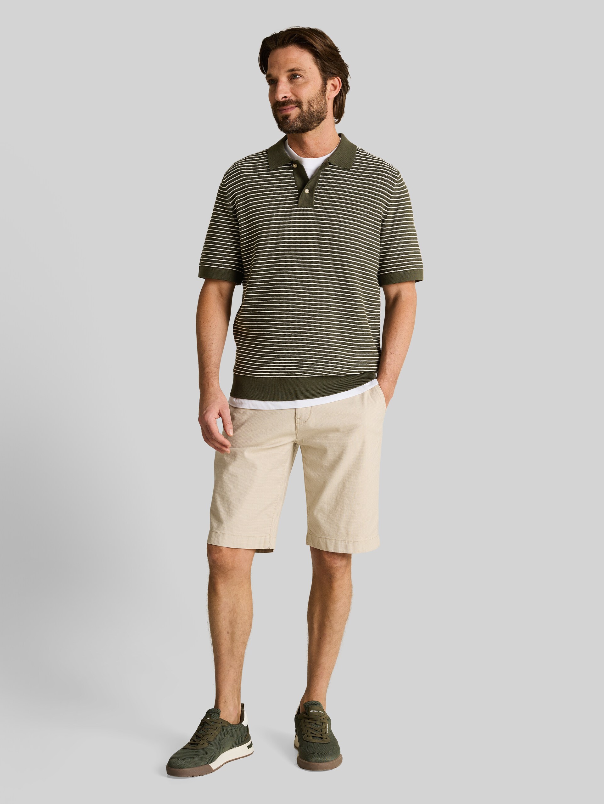 Knitted sweater with a polo collar - leaf green offwhite stripe - Model front view