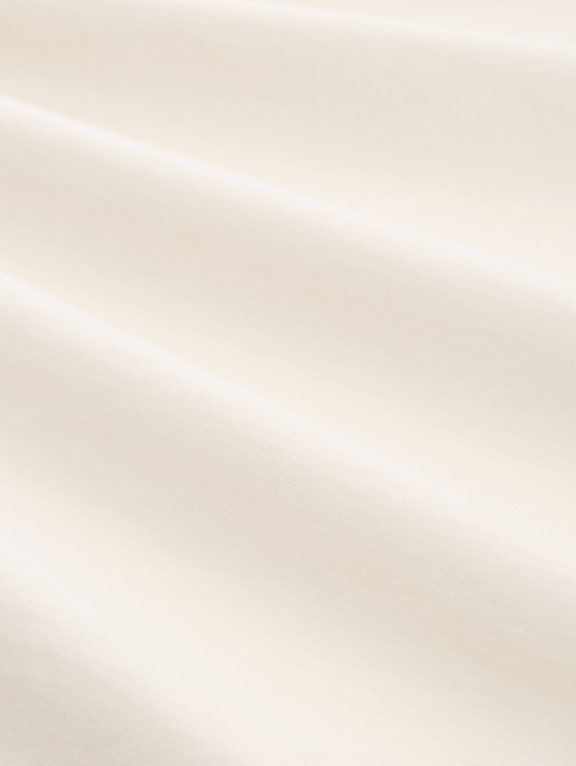 T-Shirt mit Print - Gardenia White - Material-Ansicht