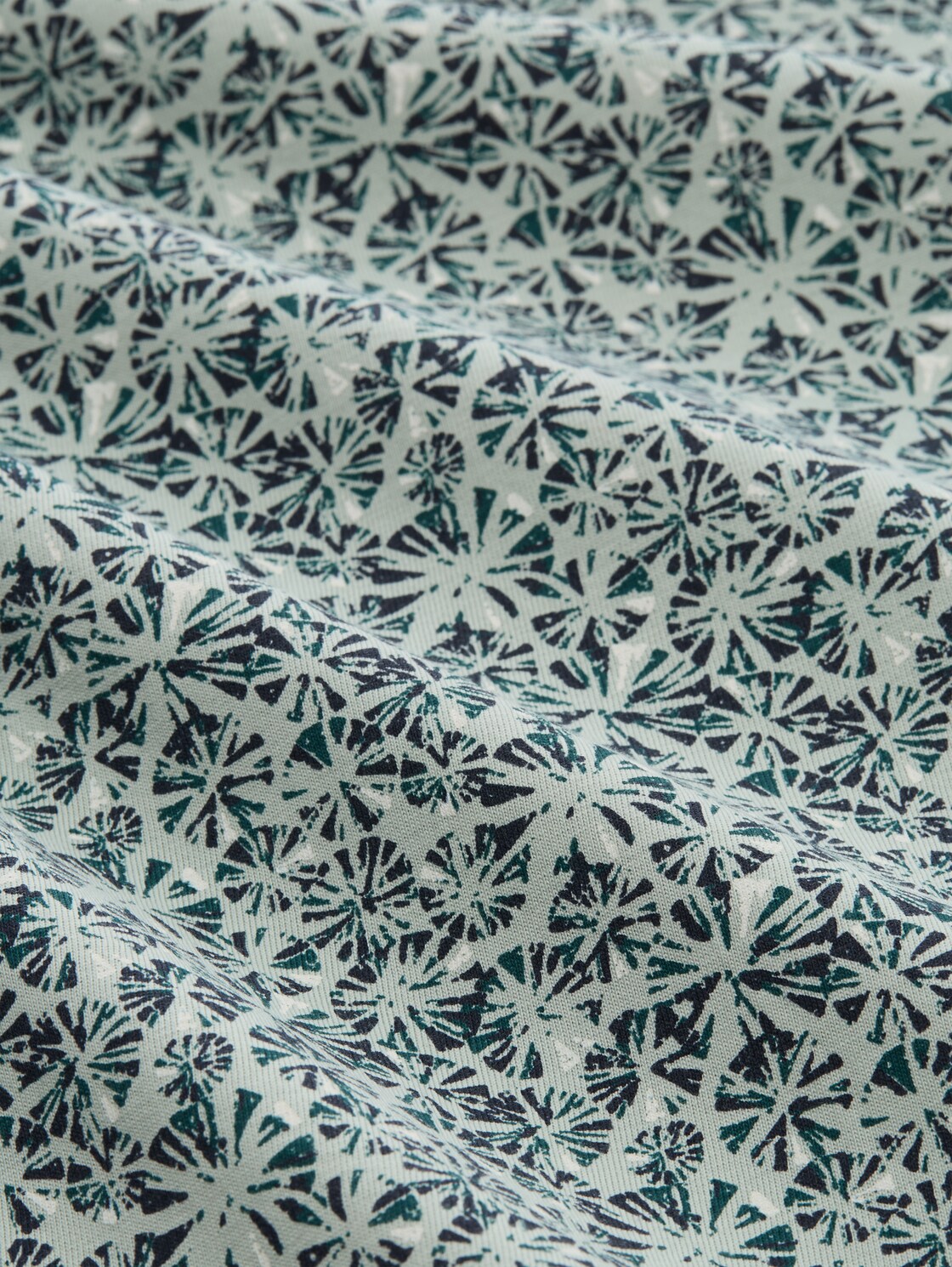 Fitted Poloshirt mit Allover-Print - mint round design