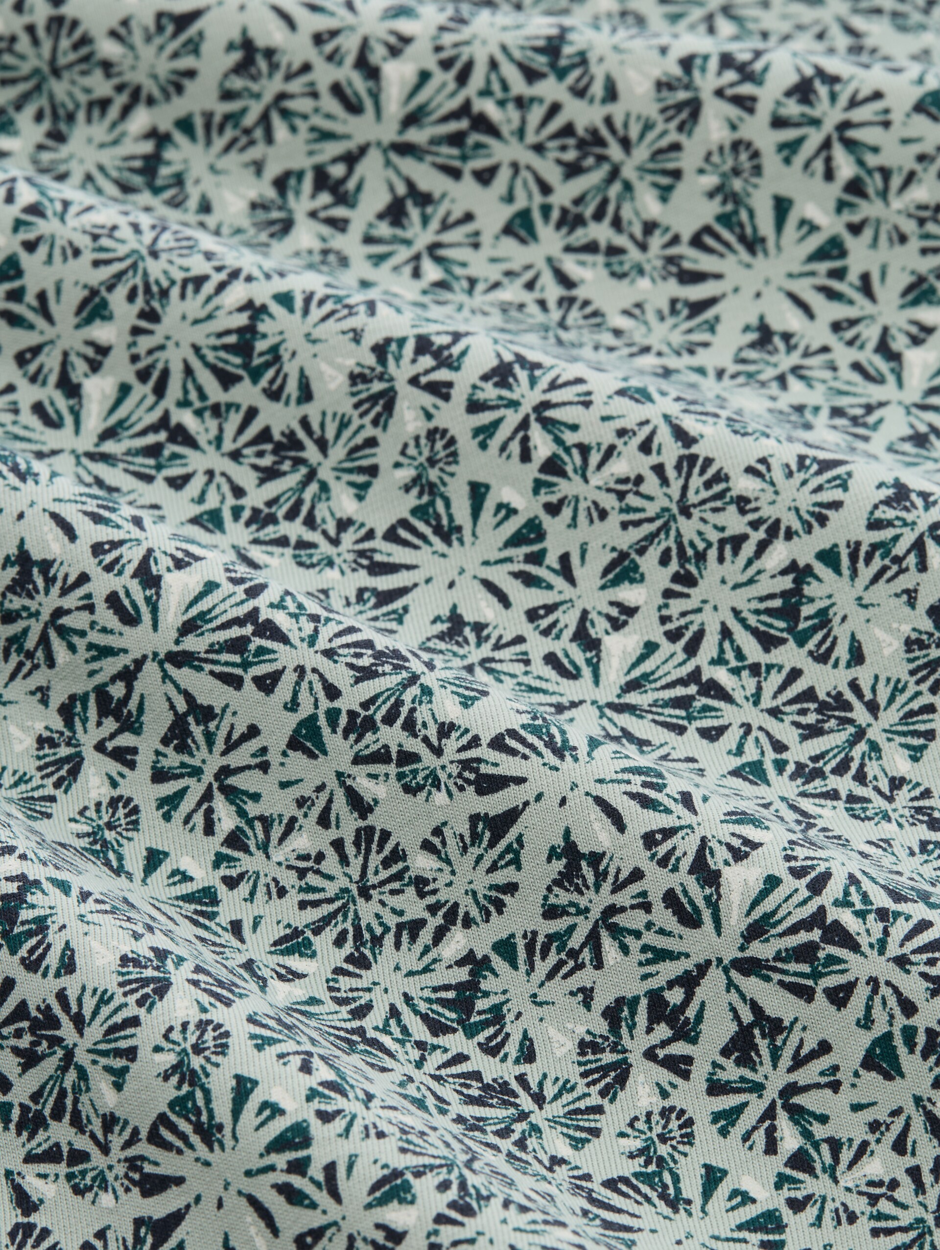 Fitted Poloshirt mit Allover-Print - mint round design