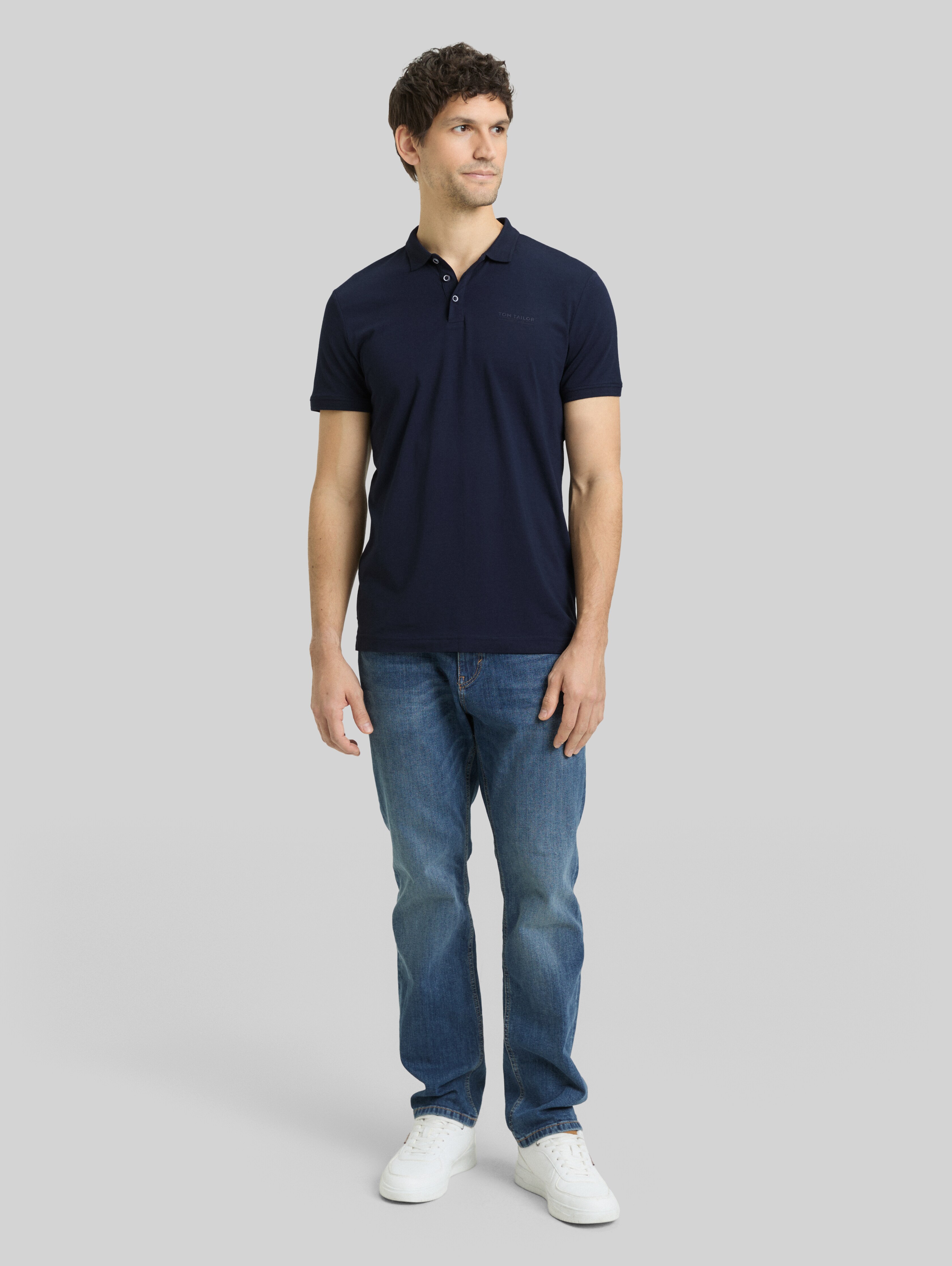 Fitted polo shirt with logo print in blue by Tom Tailor