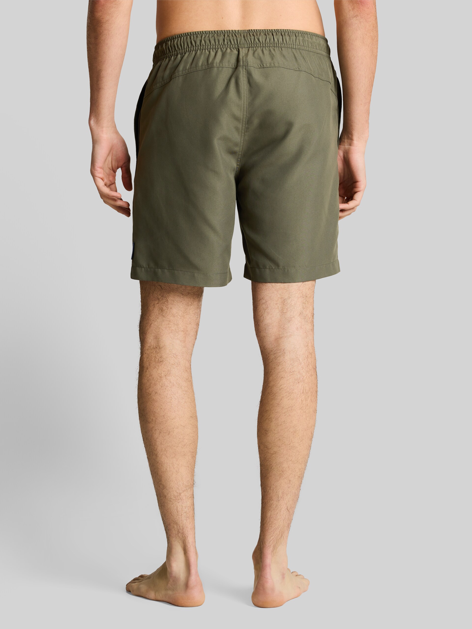 Swim shorts with drawstring - deep leaf green - Neckline model-back view
