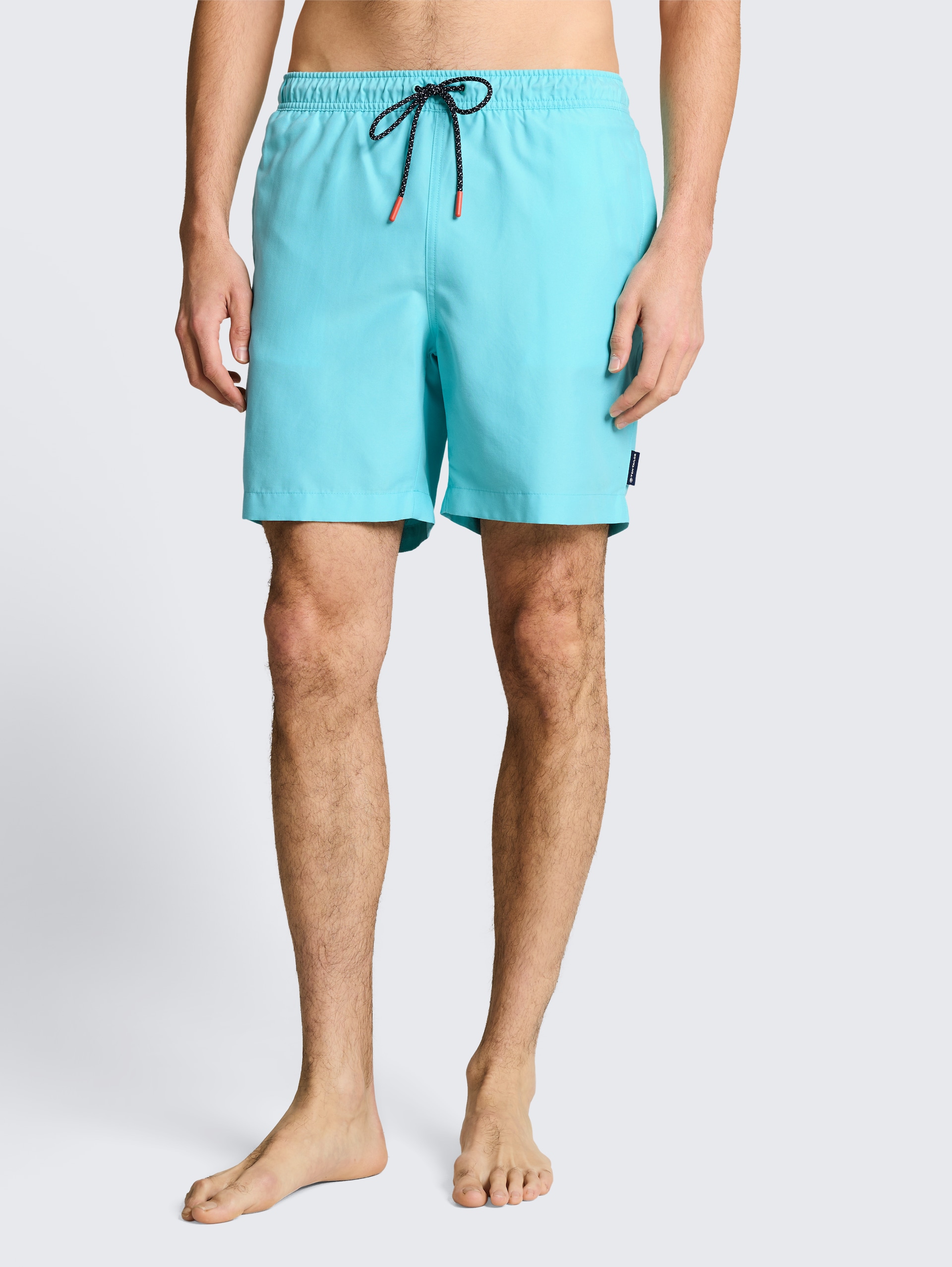 Badeshorts mit Kordelzug - river teal - Ausschnitt Model-Vorderansicht