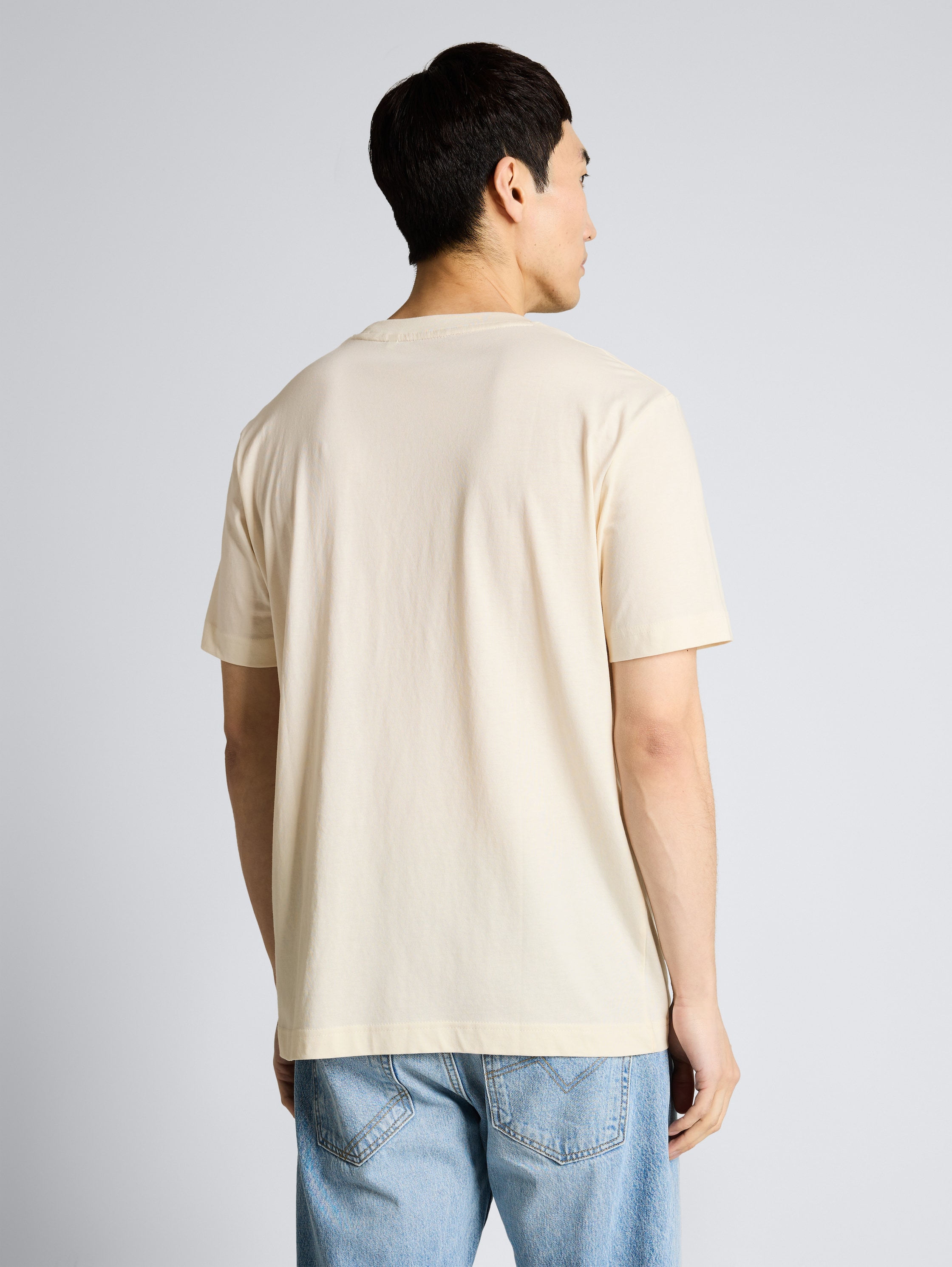 Cotton T-shirt with logo badge - Gardenia White - Neckline model-back view