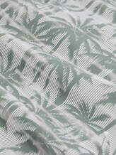Badeshorts mit Muster - sea spray stripy palm print - Material-Ansicht