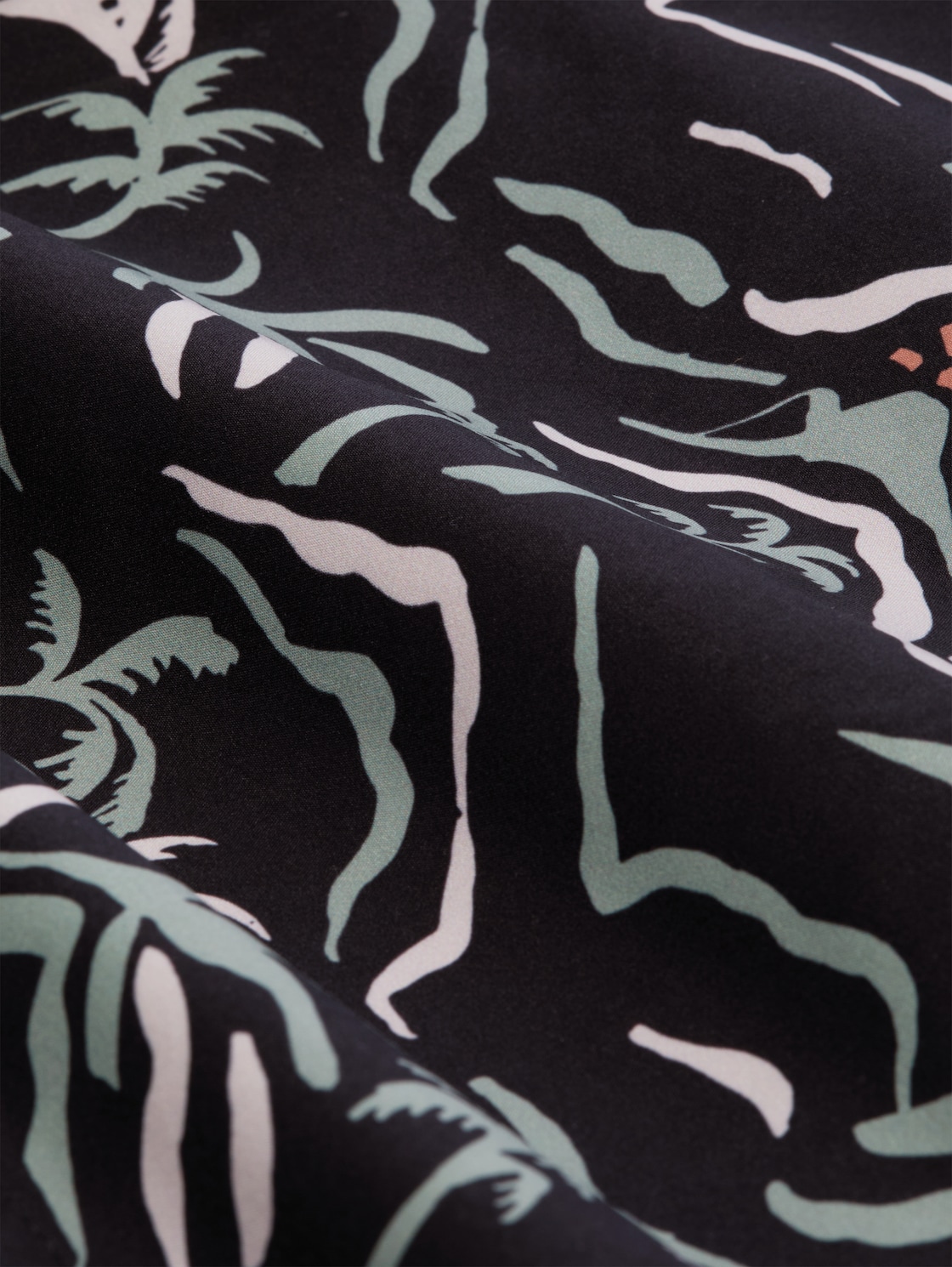 Badeshorts mit Muster - black green tropical print - Material-Ansicht