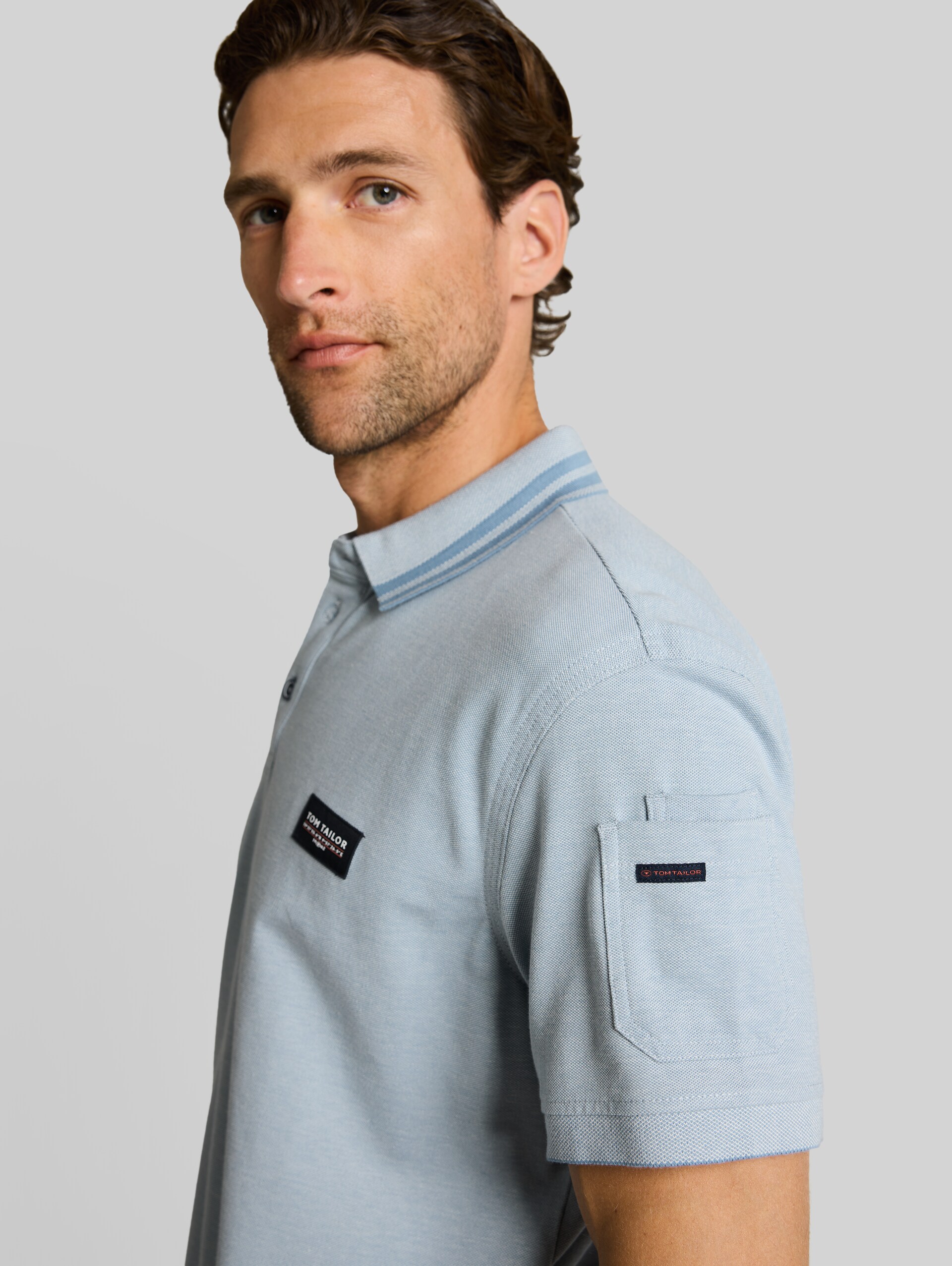Polo shirt with sleeve pocket - blue white two tone