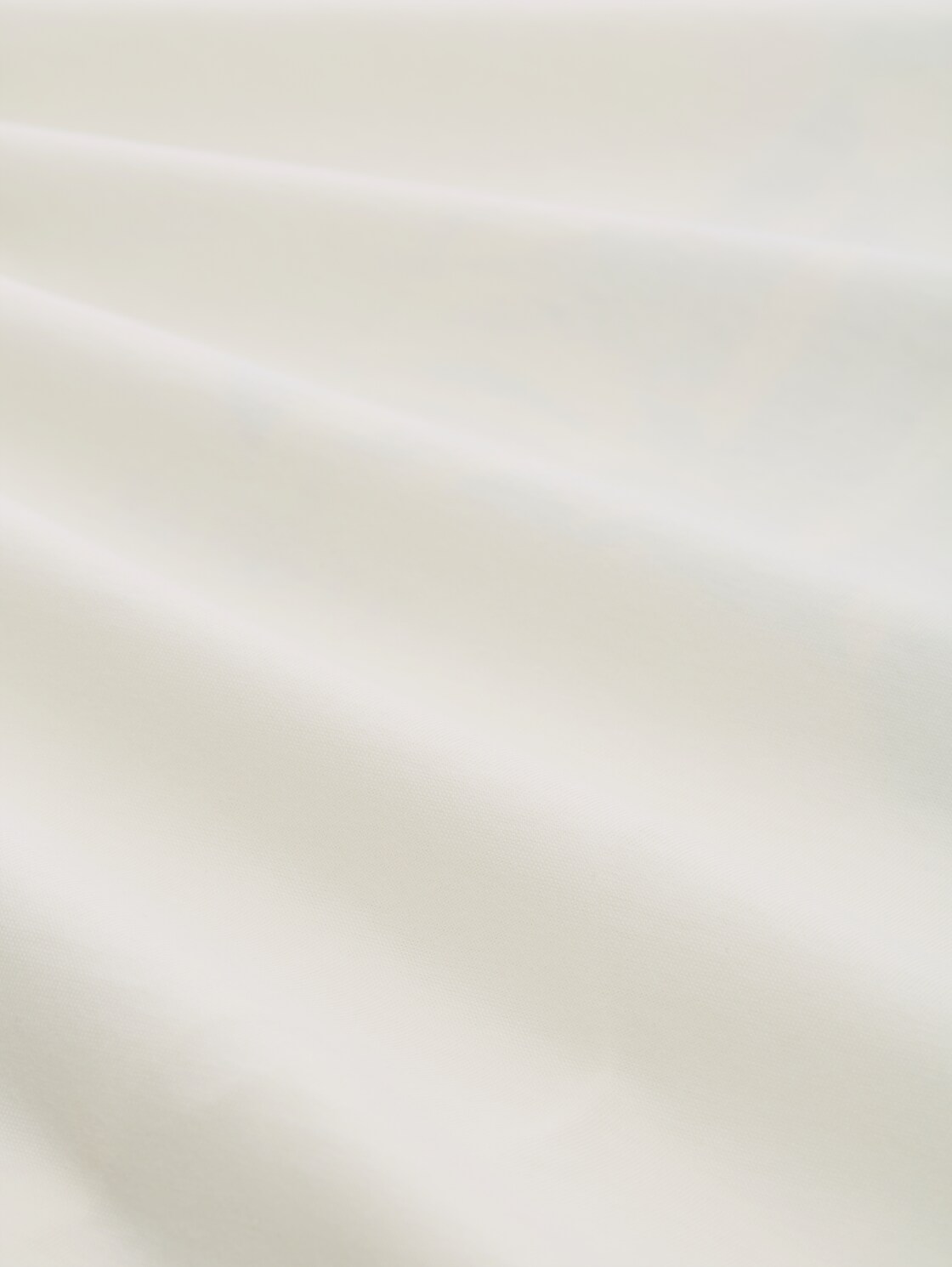 T-Shirt mit Print - Gardenia White - Material-Ansicht