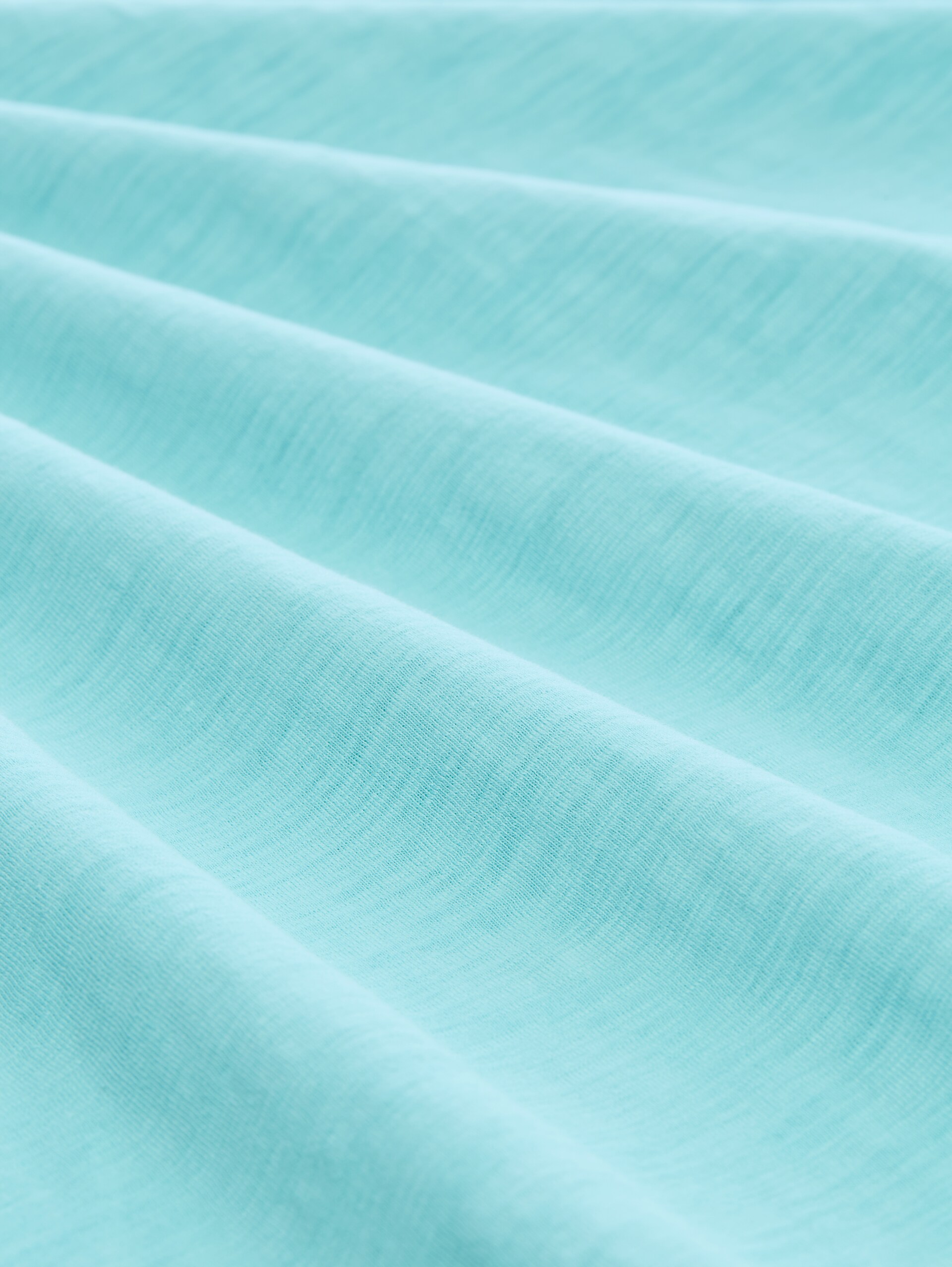 T-shirt met V-hals - river teal - Materiaalweergave