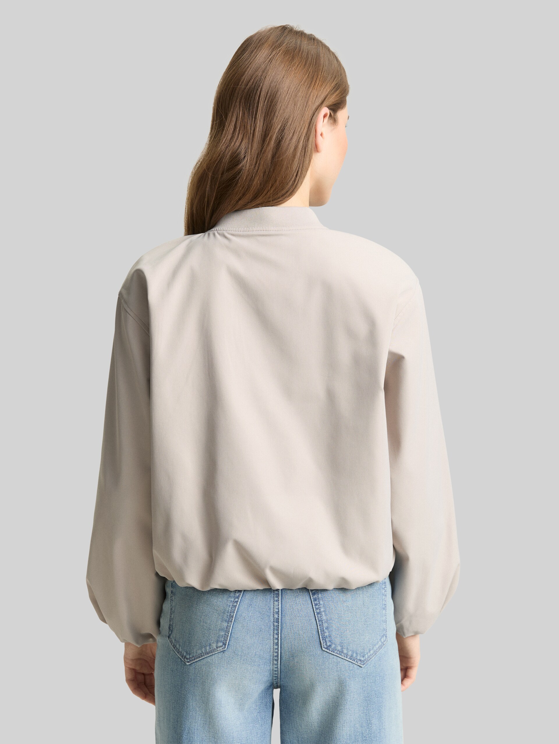 Bomber jacket made from water-repellent material - cloud grey - Model-back view