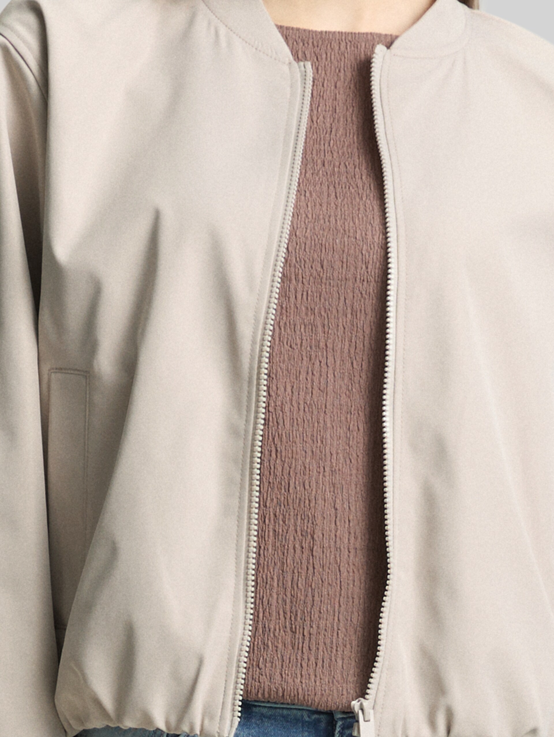 Bomber jacket made from water-repellent material - cloud grey - side model view