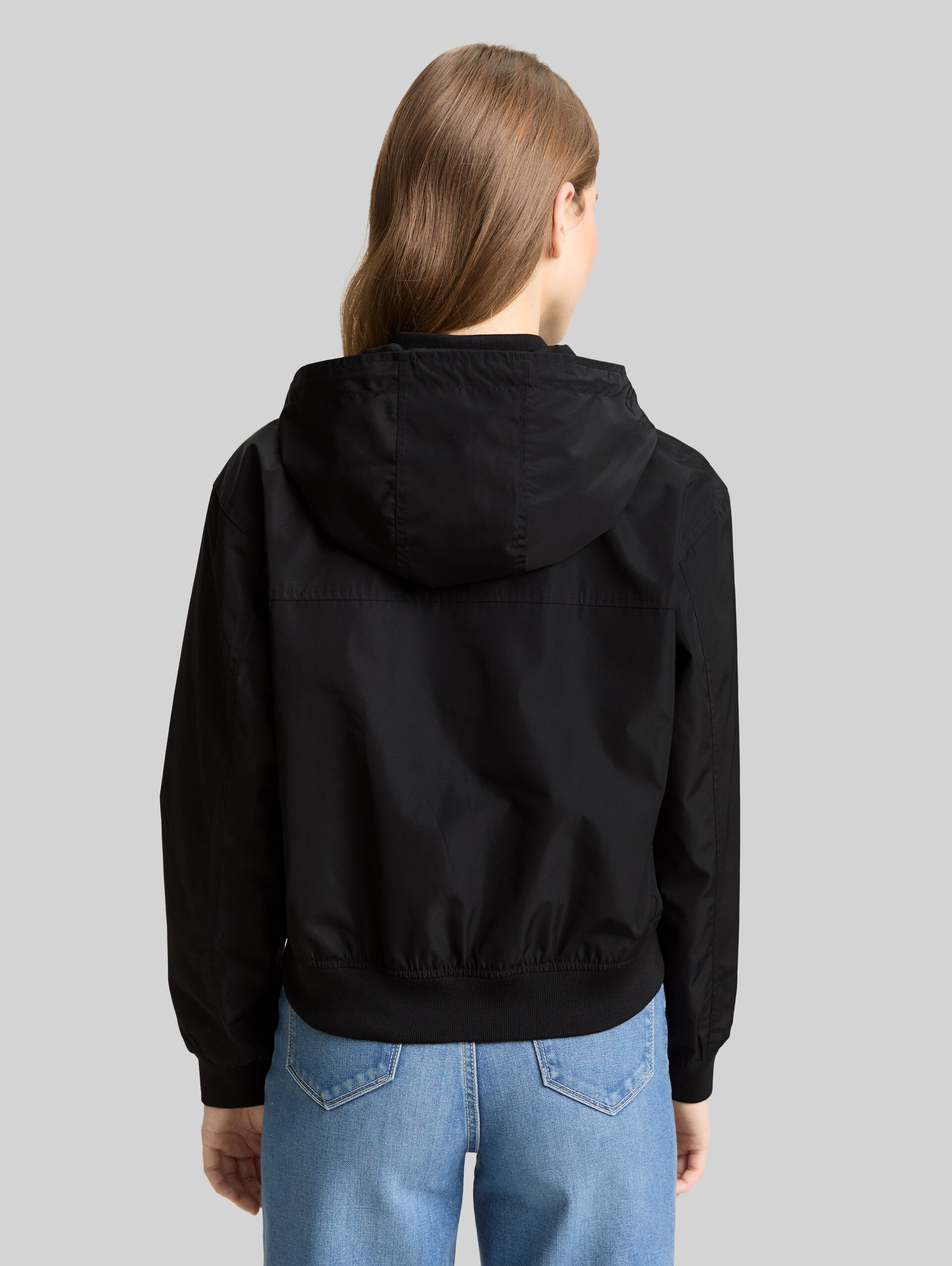 Blouson jacket made from water-repellent material - deep black - Model-back view