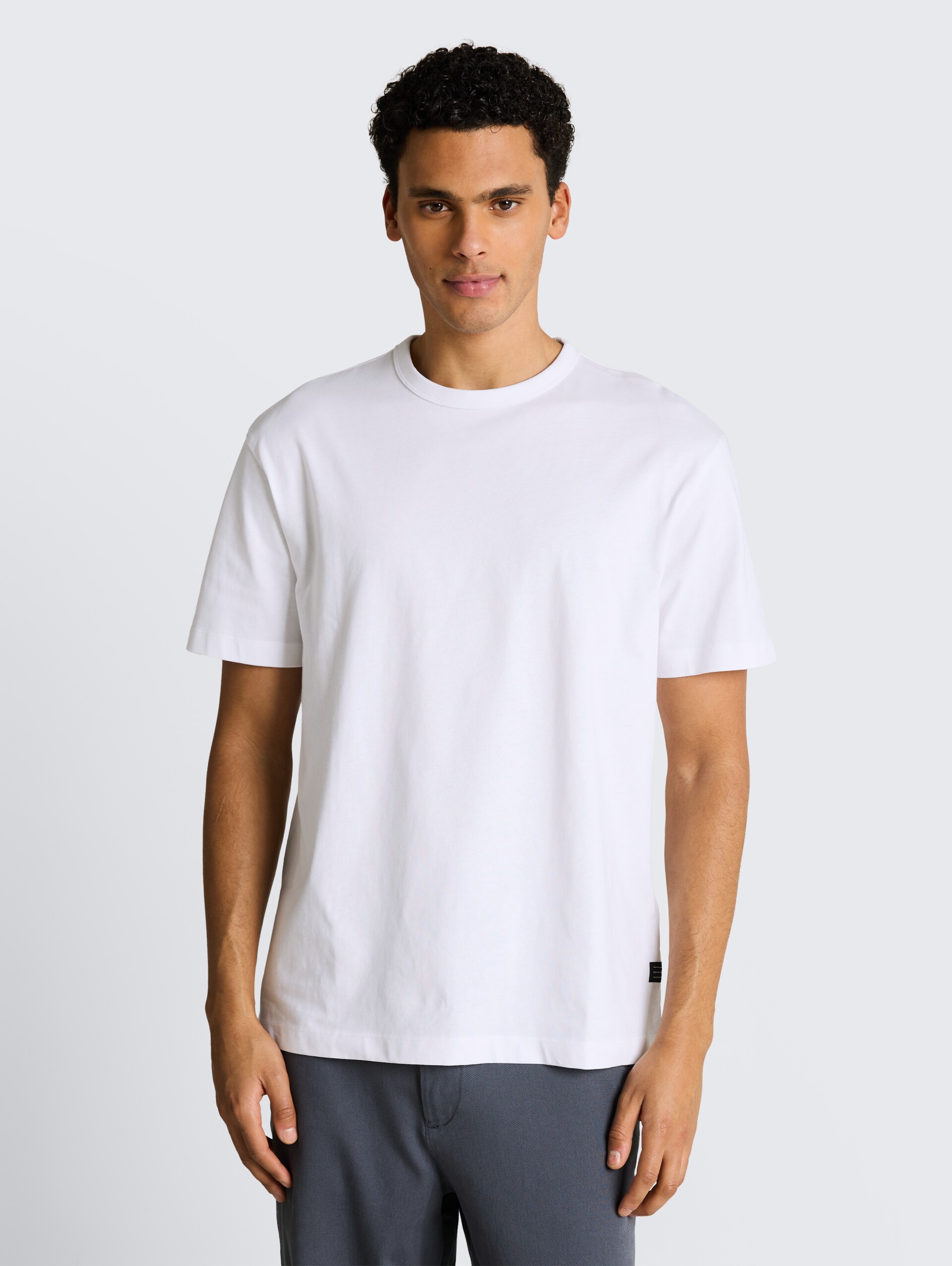 Relaxed fit T-shirt van katoen - White - Nek model vooraanzicht