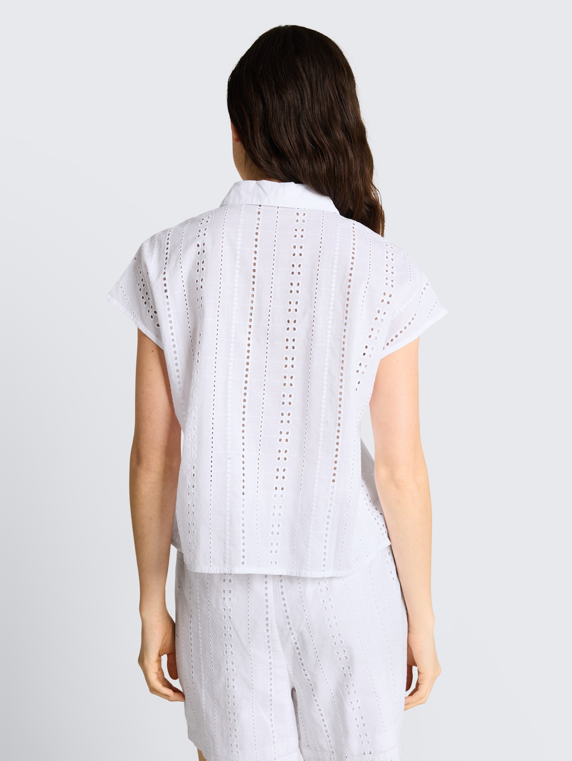 Blouse with eyelet embroidery - White - Neckline model-back view