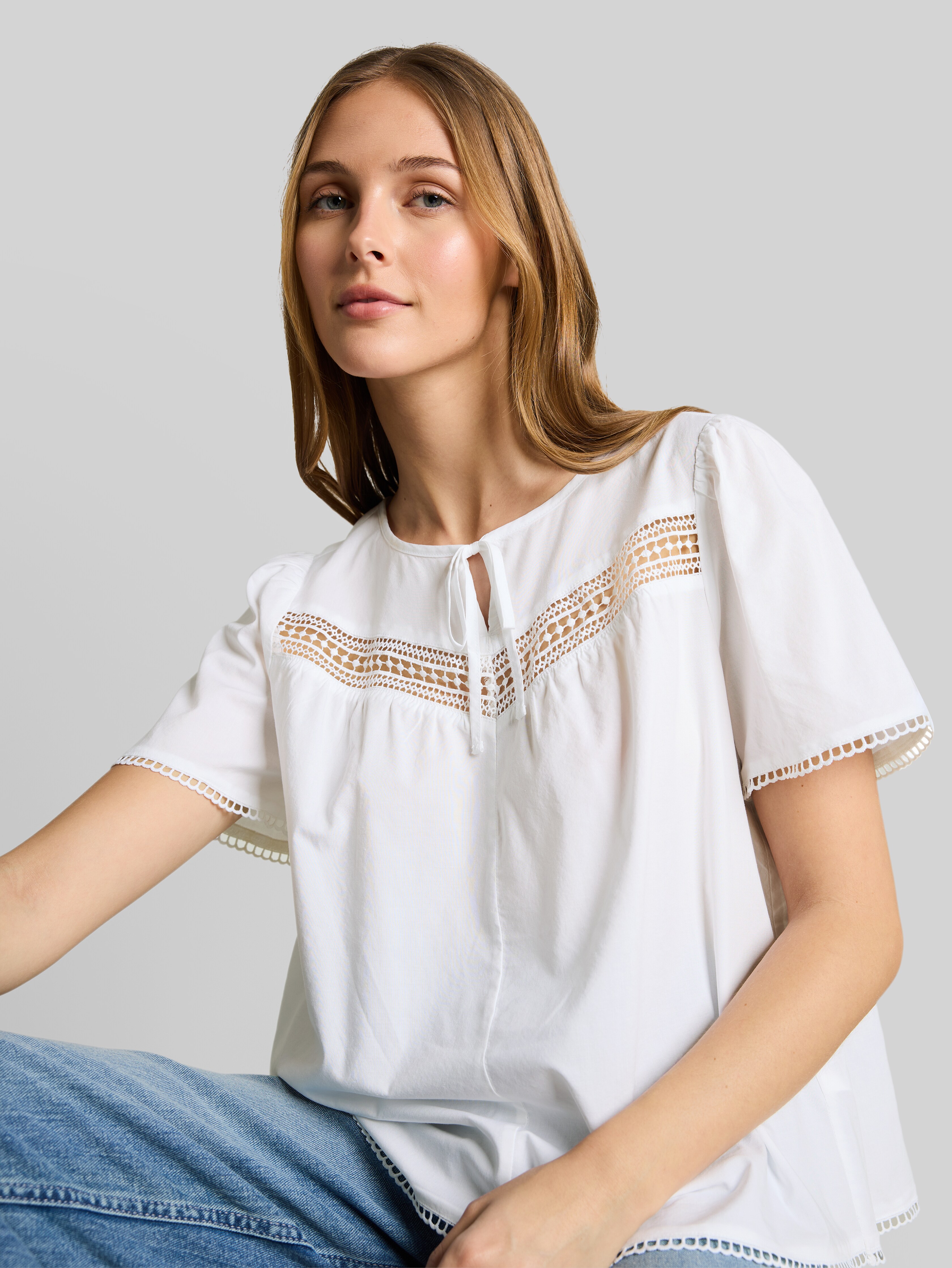 Blouse with crochet details in white by Tom Tailor