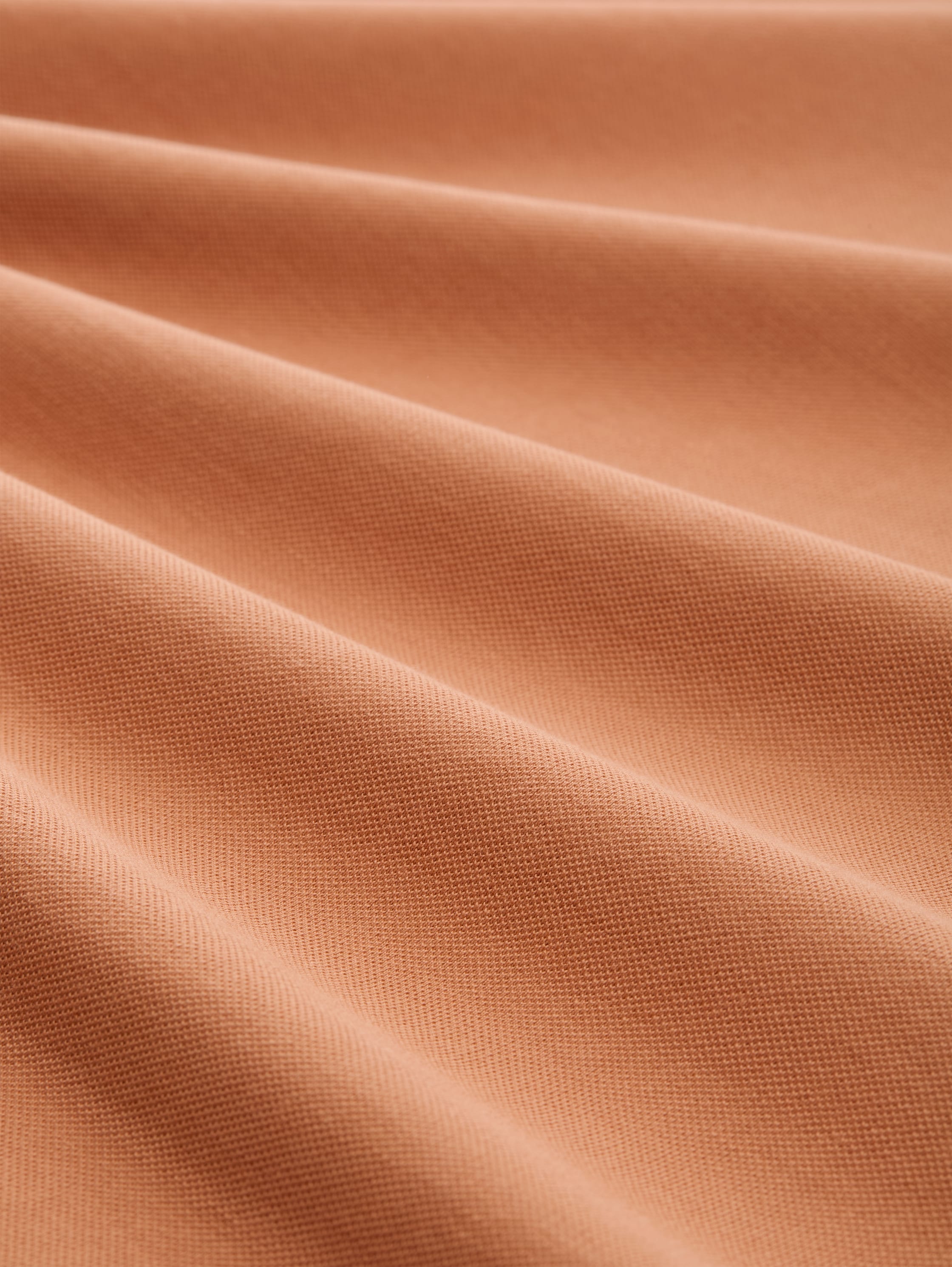 Piqué Poloshirt aus Baumwolle - faded_copper_orange - 