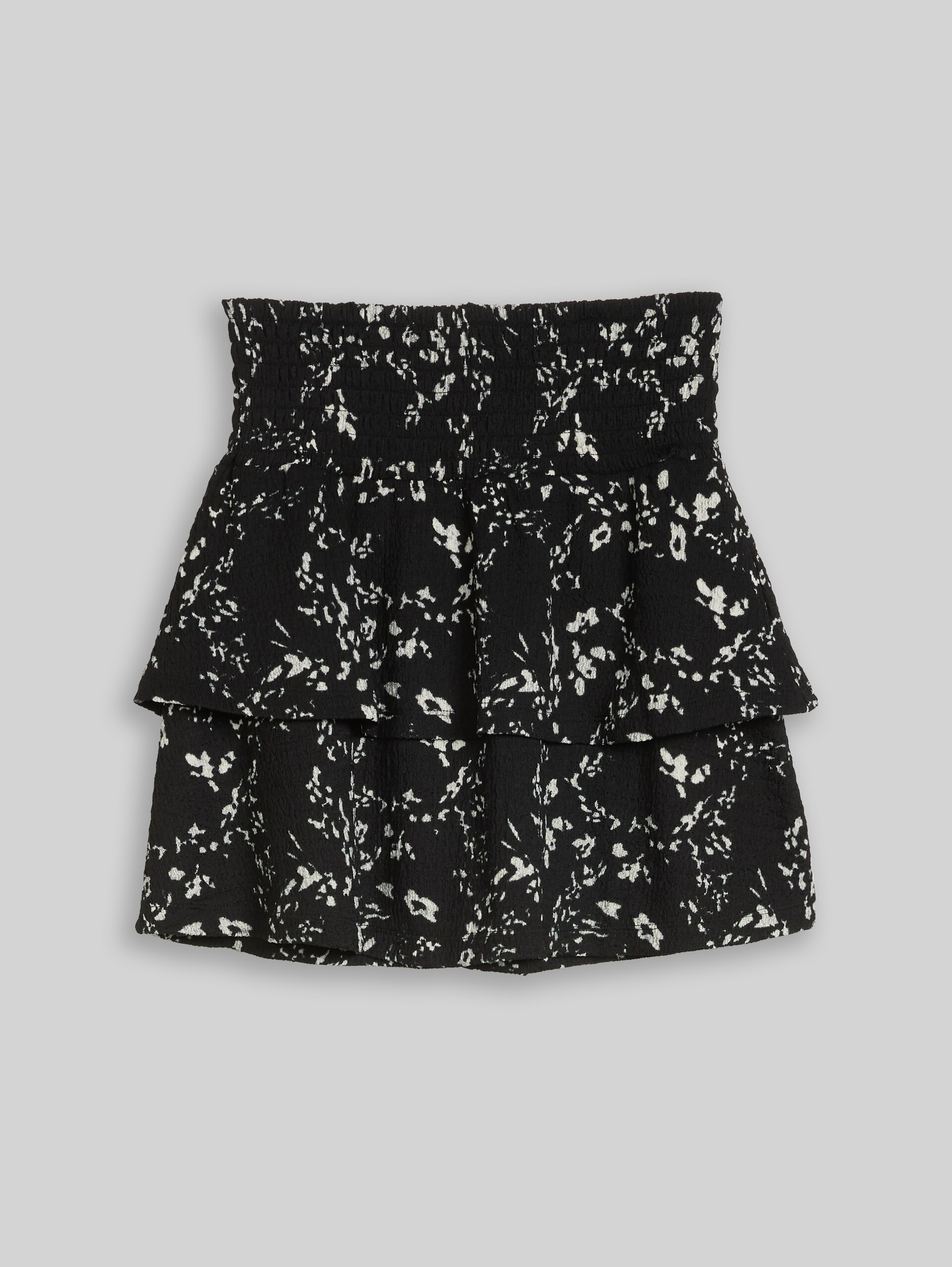 Mini-jupe froissée à volants - black white flower print - Vue de face du produit
