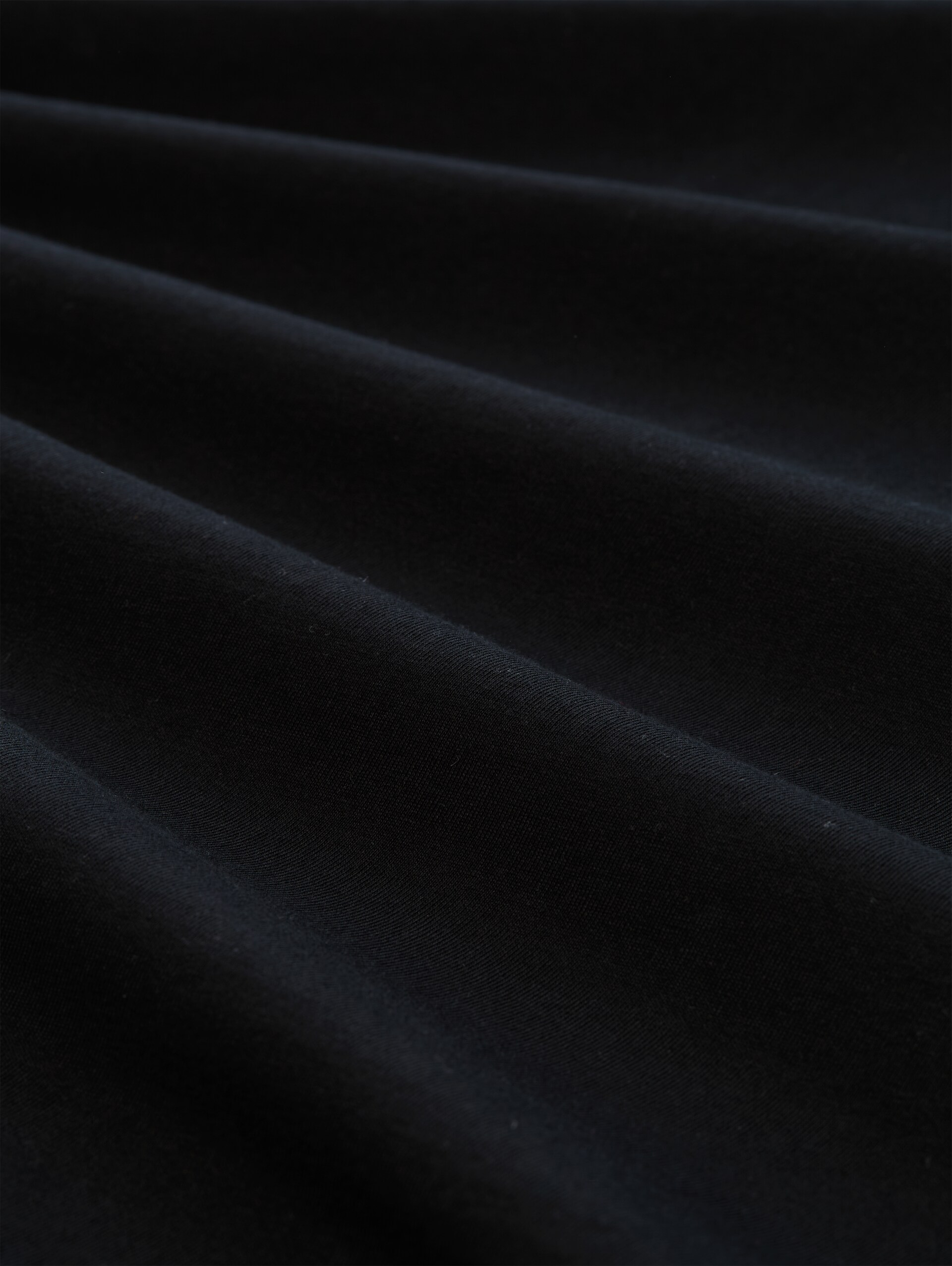 T-Shirt mit Print - Black - Material-Ansicht