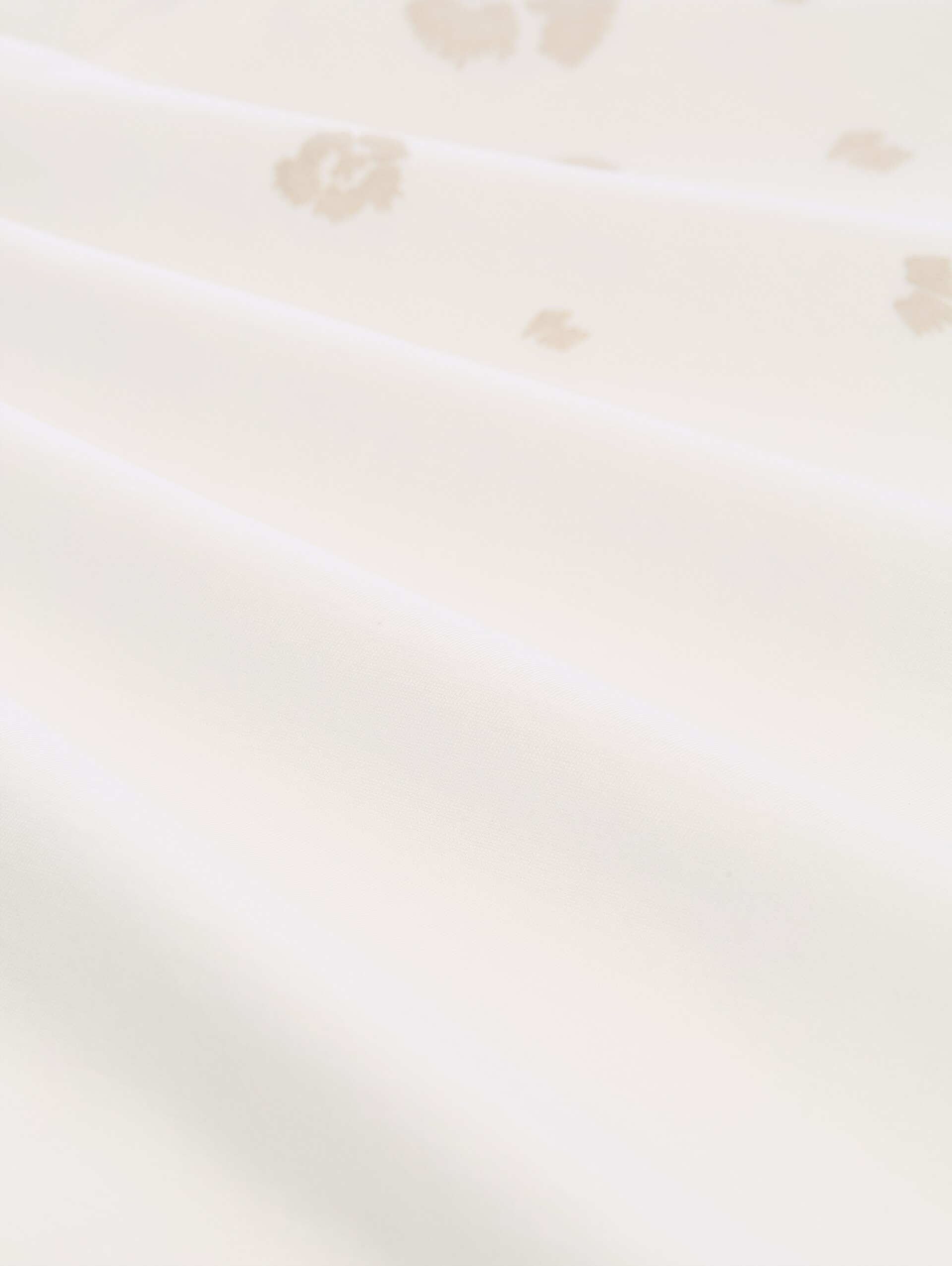 T-Shirt mit Print - Soft Clear White - Material-Ansicht