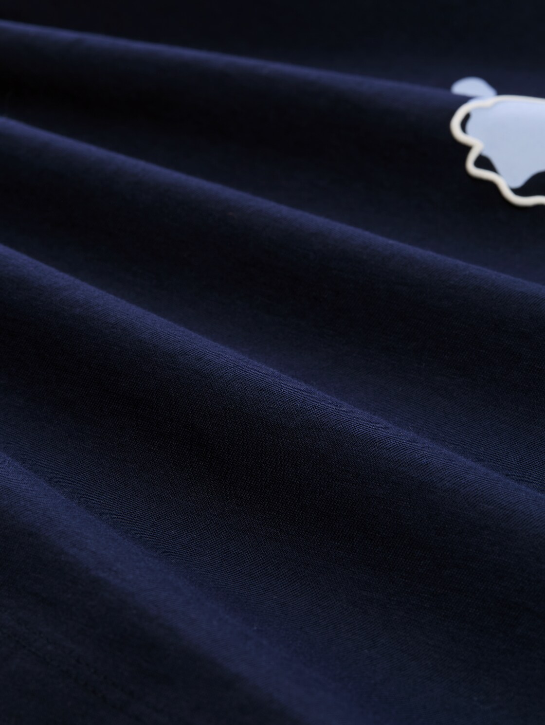 T-Shirt mit Print - sky captain blue - Material-Ansicht