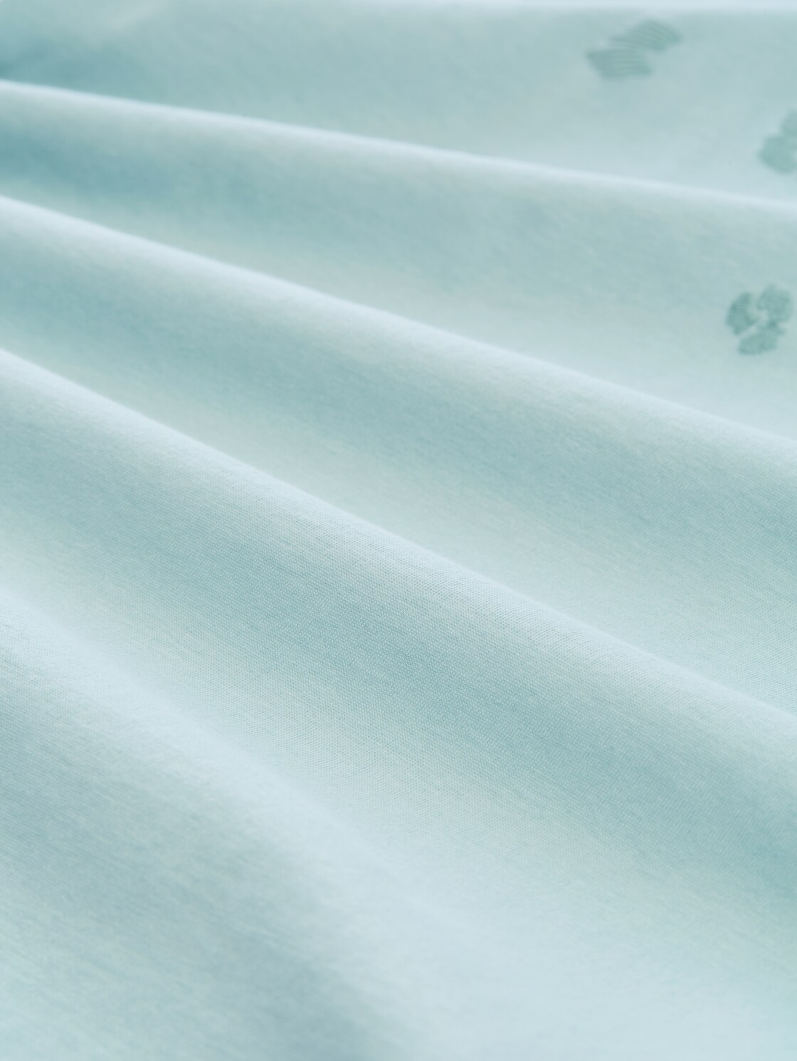 T-Shirt mit Print - blue haze - Material-Ansicht