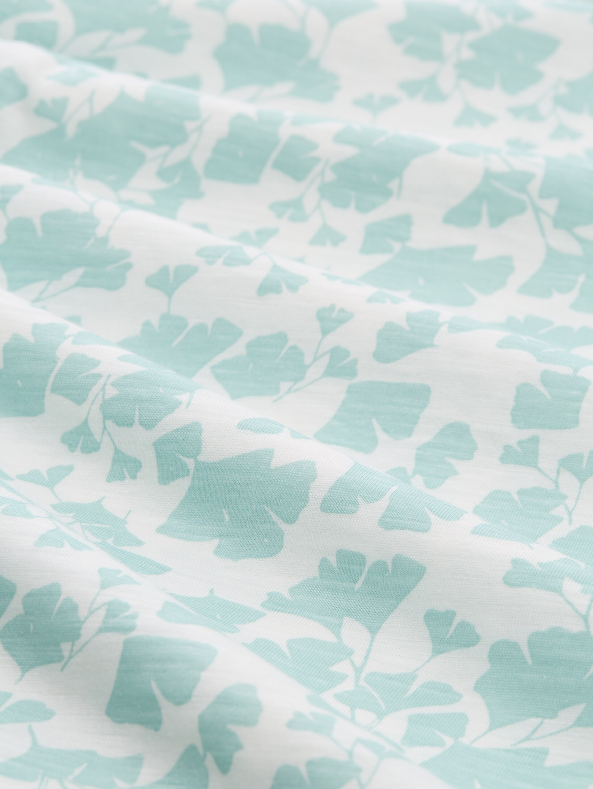 T-Shirt aus Baumwolle - green ginkgo minimal - Material-Ansicht