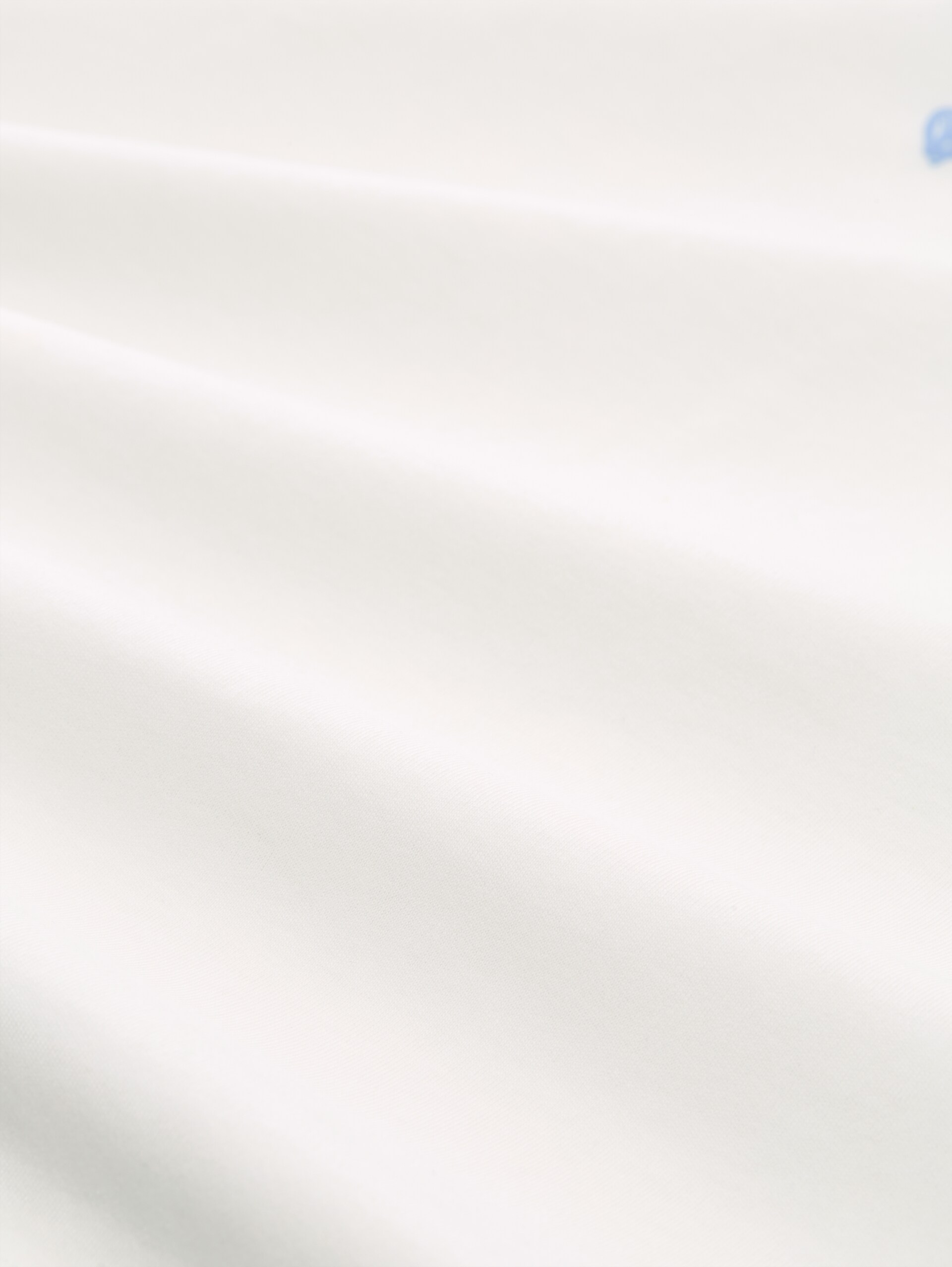 T-Shirt aus Baumwolle - off white - Material-Ansicht