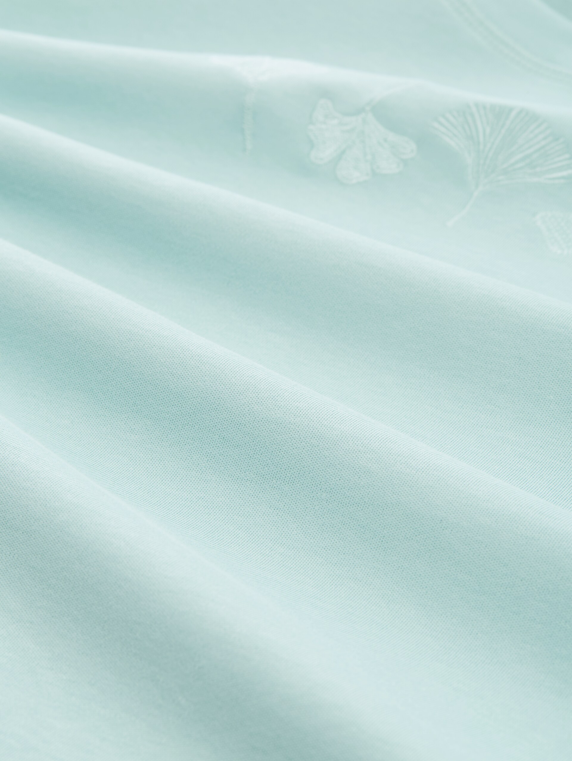 T-Shirt aus Baumwolle - light blue green - Material-Ansicht