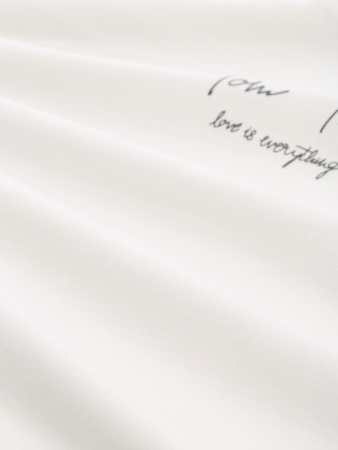 T-Shirt mit Logo-Print - Whisper White - Material-Ansicht