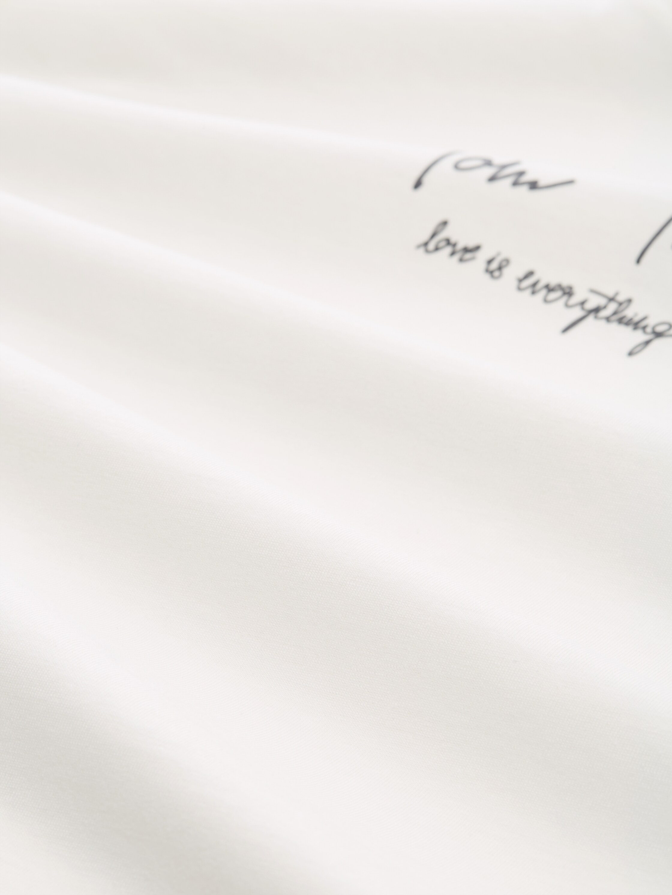 T-Shirt mit Logo-Print - Whisper White - Material-Ansicht