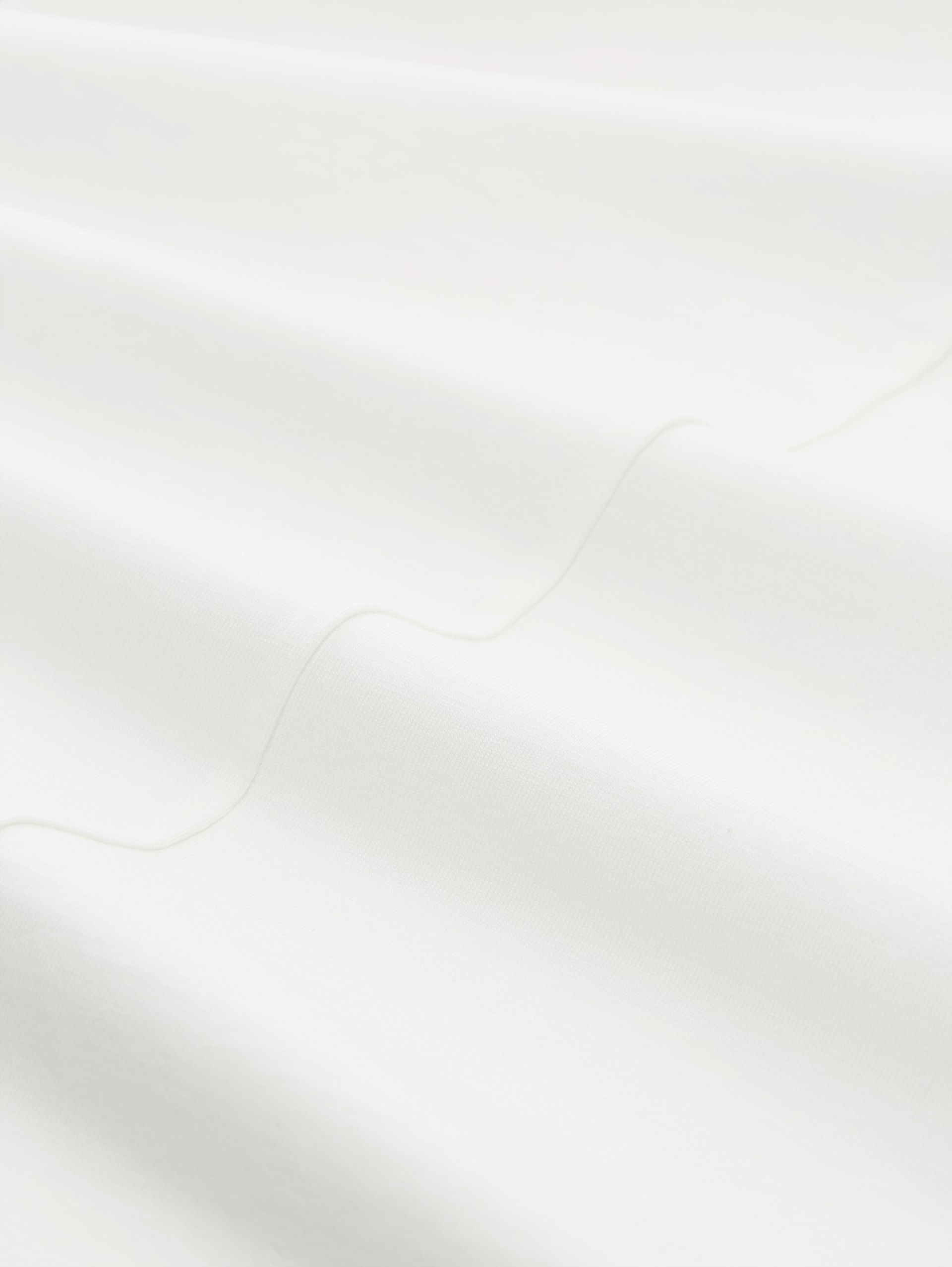 Slim Fit Top mit Rundhalsausschnitt - Whisper White - Material-Ansicht