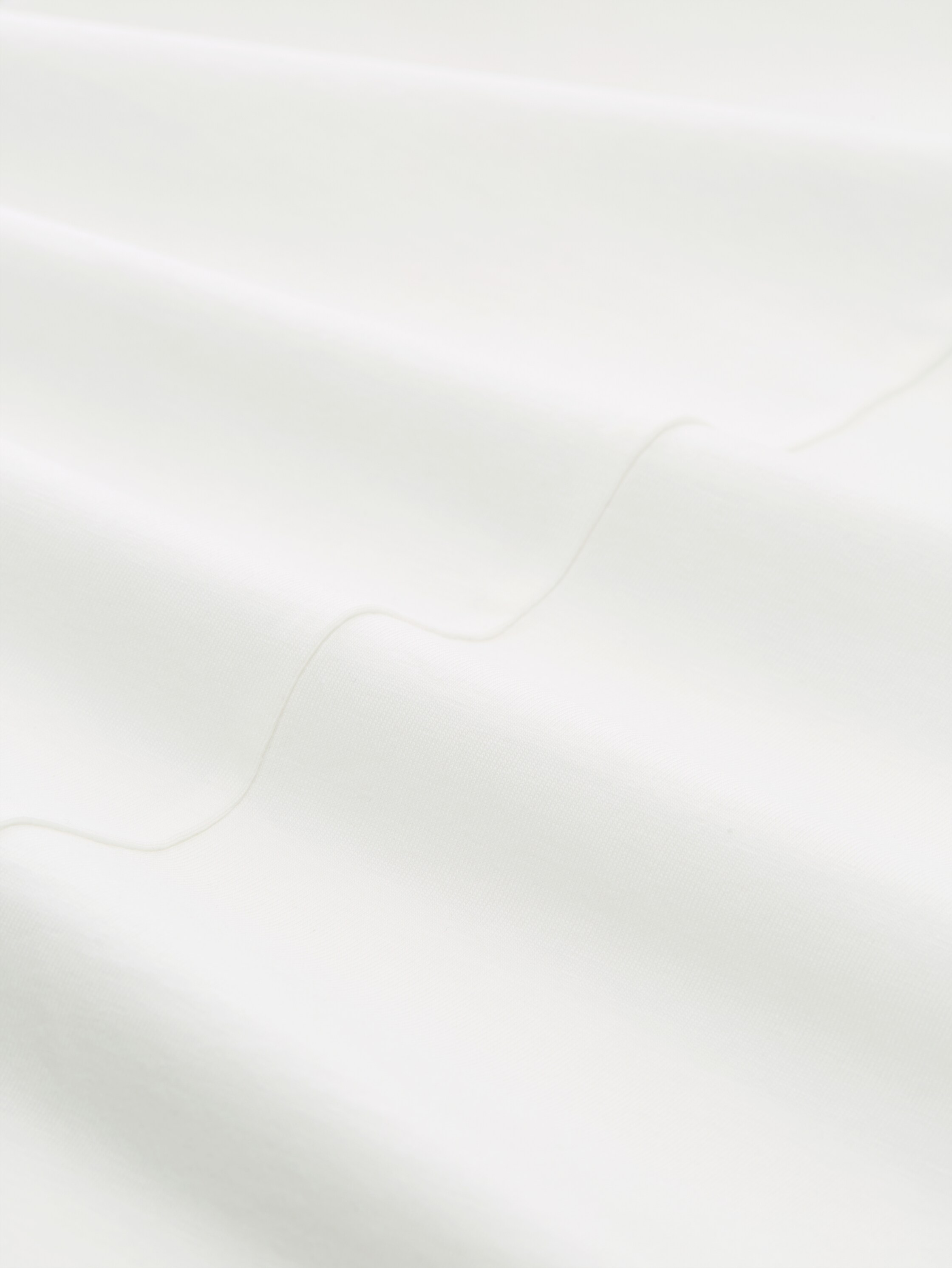 Slim Fit Top mit Rundhalsausschnitt - Whisper White - Material-Ansicht