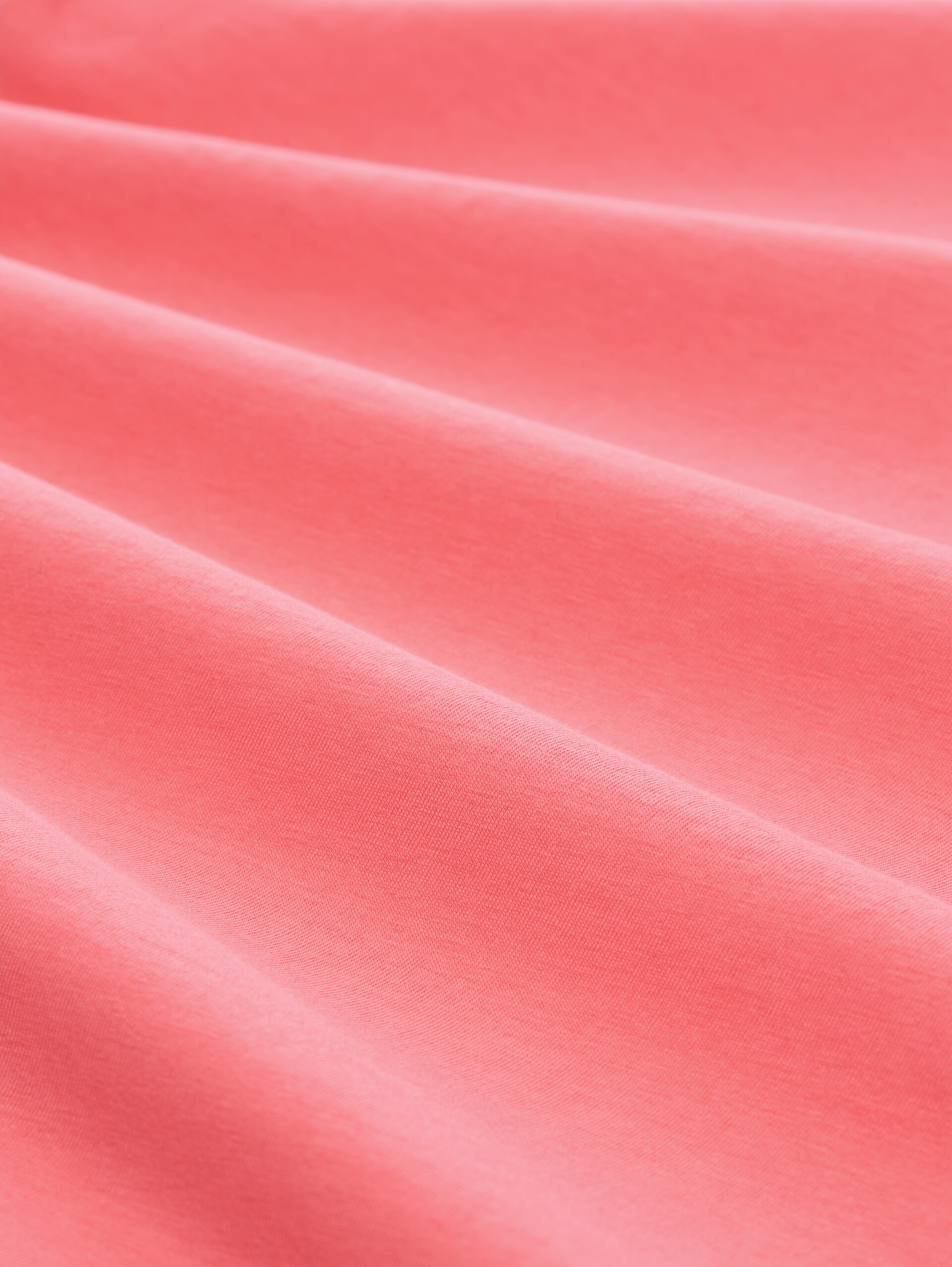 T-Shirt mit Print - soft coral pink - Material-Ansicht
