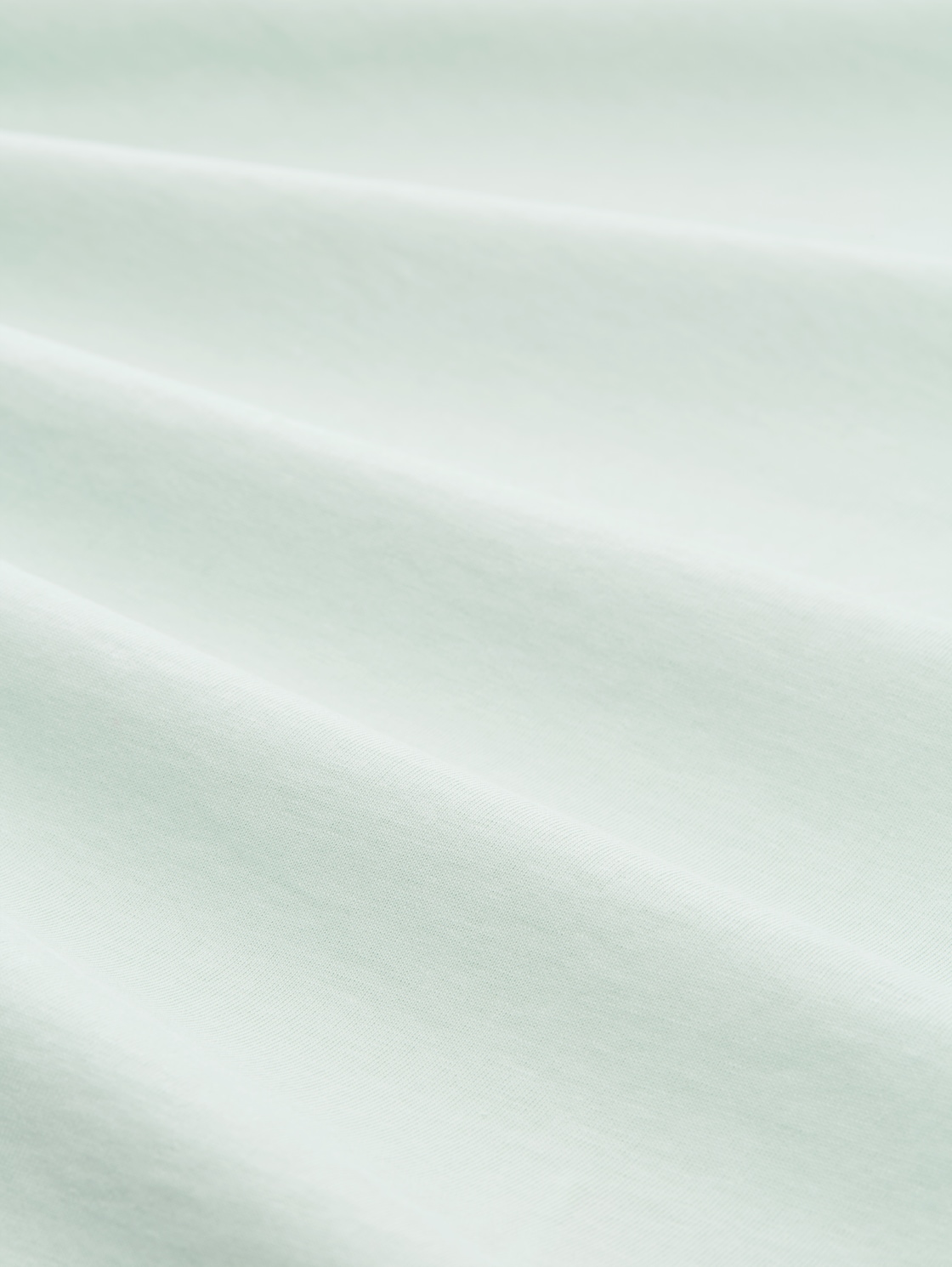 T-Shirt mit Stickerei - light matcha green - Material-Ansicht