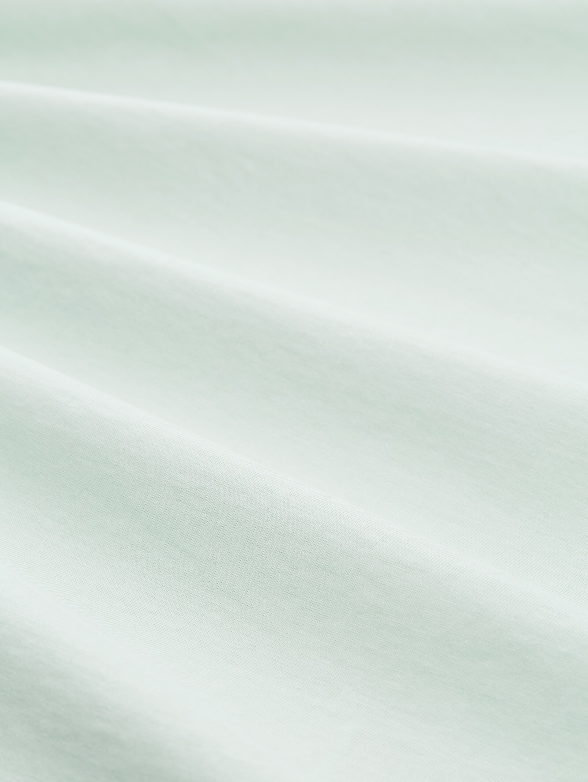 T-Shirt mit Stickerei - light matcha green - Material-Ansicht