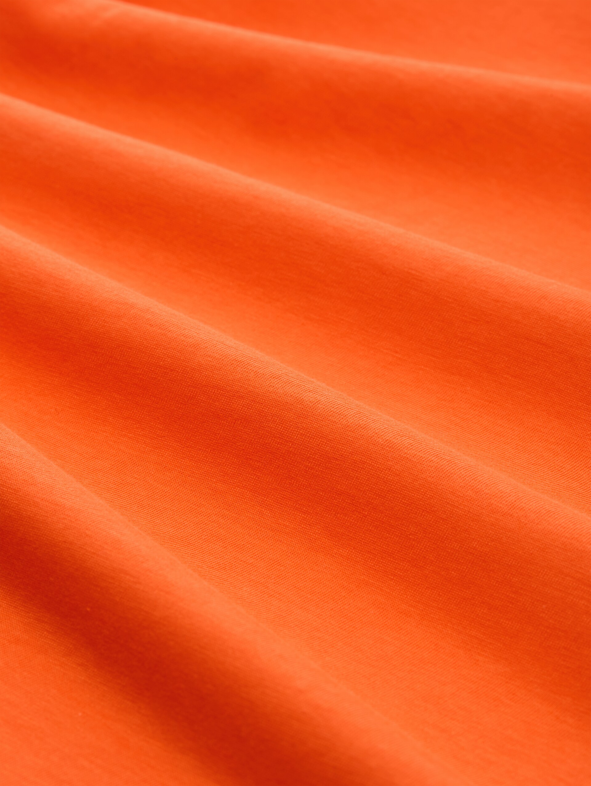 T-Shirt mit Print - Fiery Orange - Material-Ansicht
