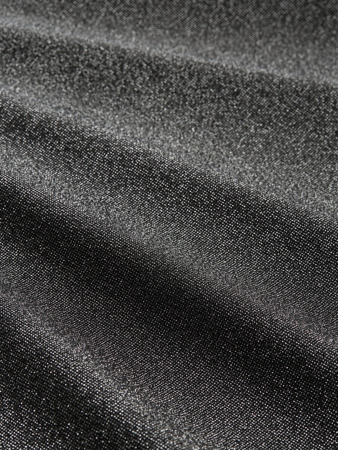 Glitzer T-Shirt mit Fledermausärmeln - black glitter - Material-Ansicht