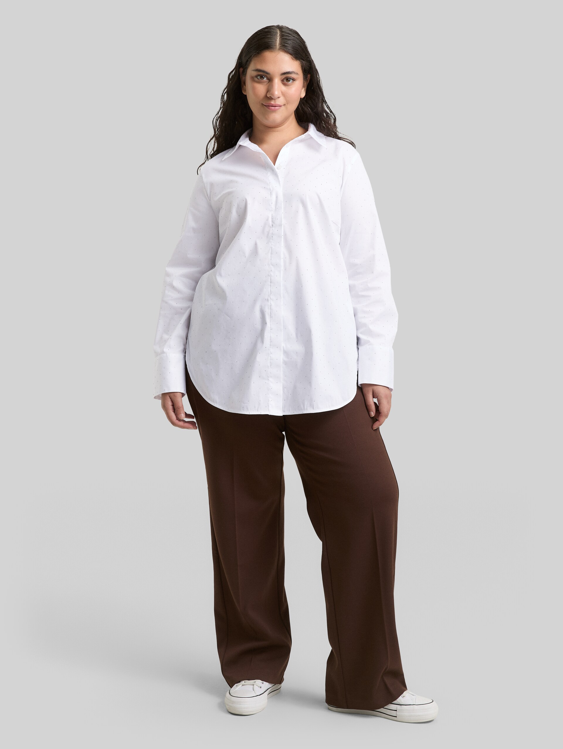 Plus Size - Loose fit blouse with rhinestones - stones on solid - Model front view