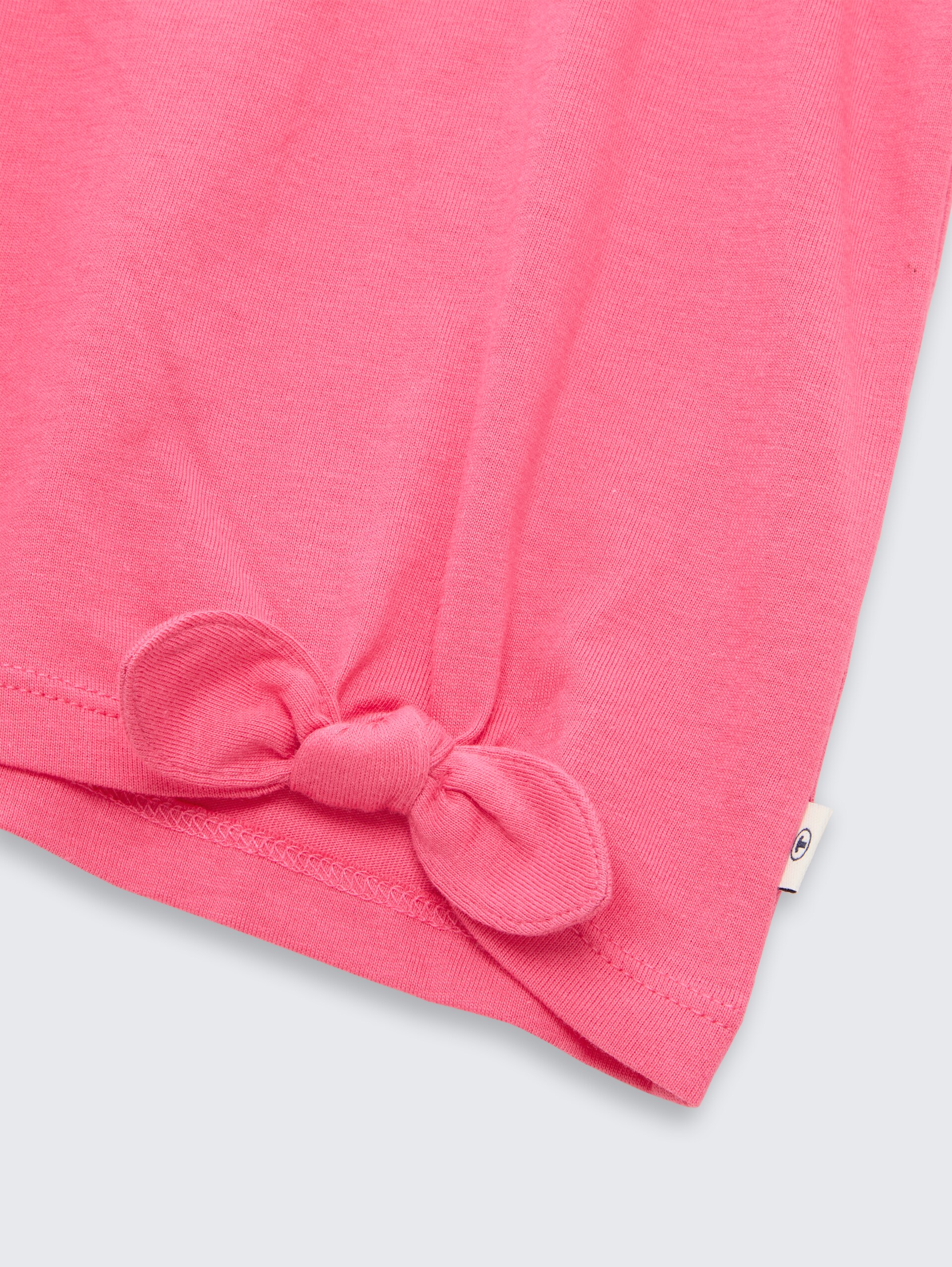 T-shirt met knoopdetail - Flashy Pink - Detailaanzicht model