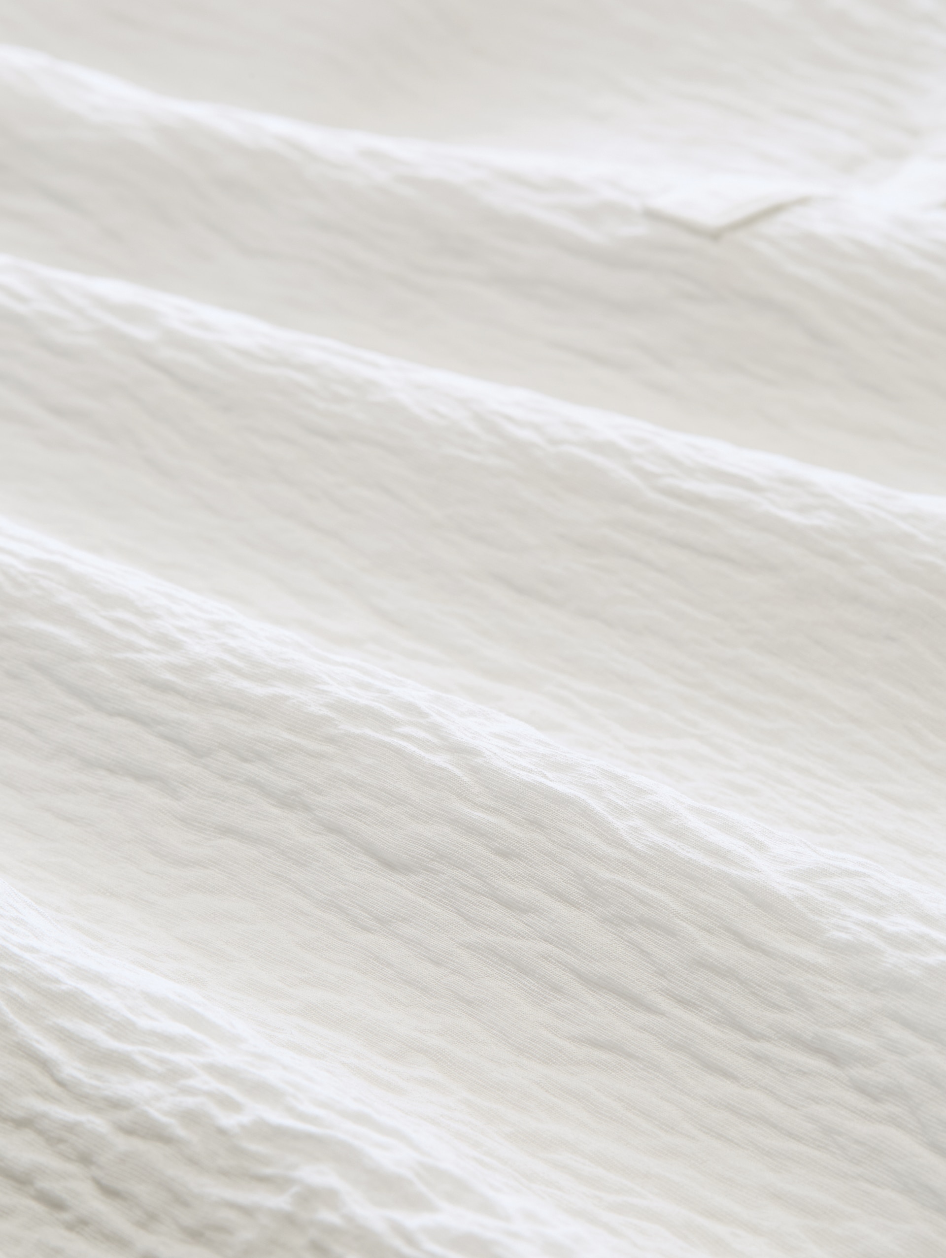 Losvallende blouse met V-hals - Whisper White - Materiaalweergave